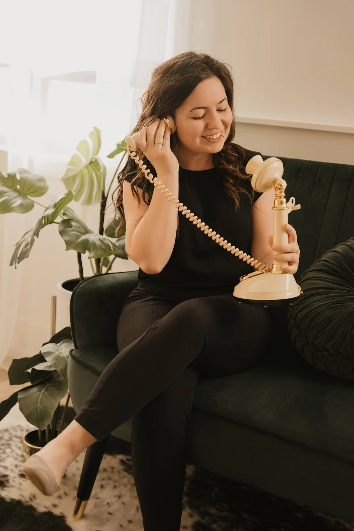 CBT therapist in Barrie, Ontario talking on a vintage phone
