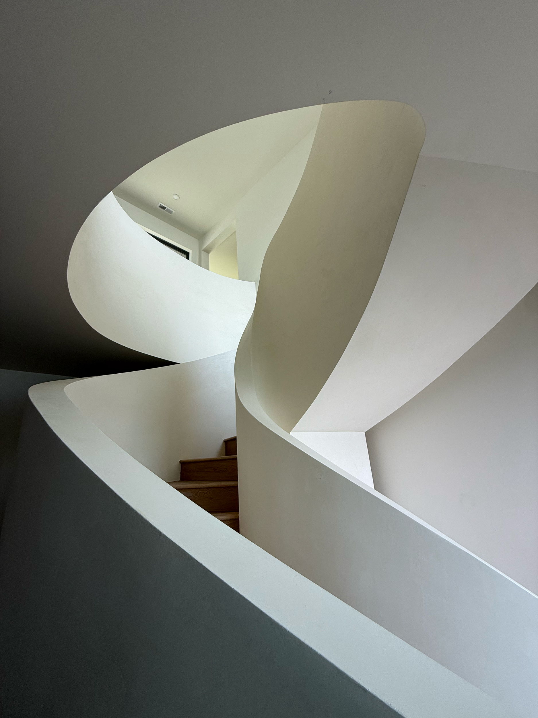 White Tadelakt on Spiral Staircase