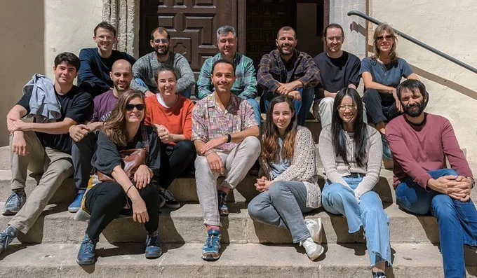 Hugging Face team photograph representing open collaboration, knowledge sharing, and collective innovation.