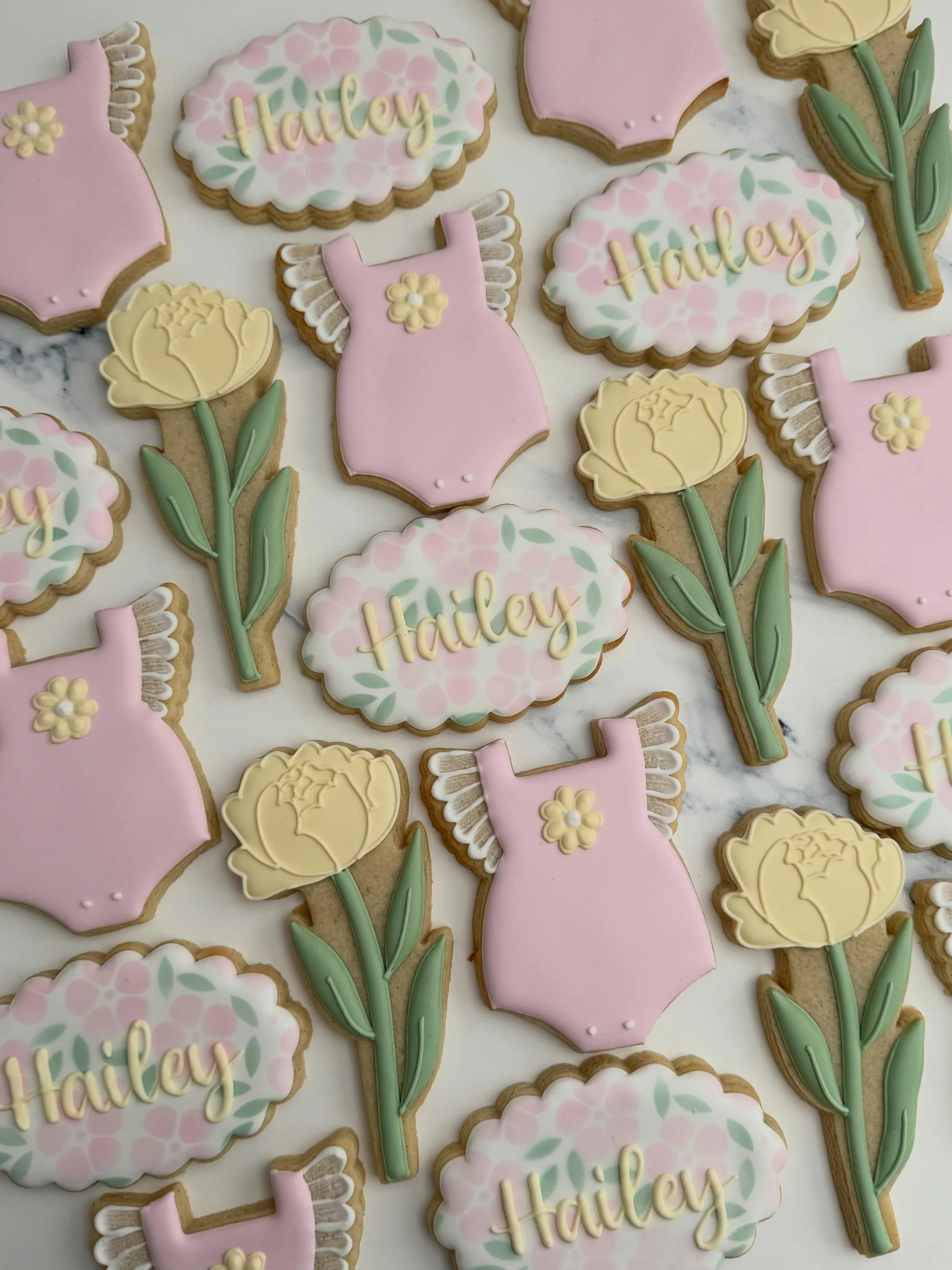 If it&rsquo;s a tea party, it has to be this pretty 🌸

Custom cookies with soft florals, baby details, and a dreamy pastel palette to welcome baby Hailey into the world. 

#tatestreats #babyshower #babygirlshower #teapartytheme #floralcookies