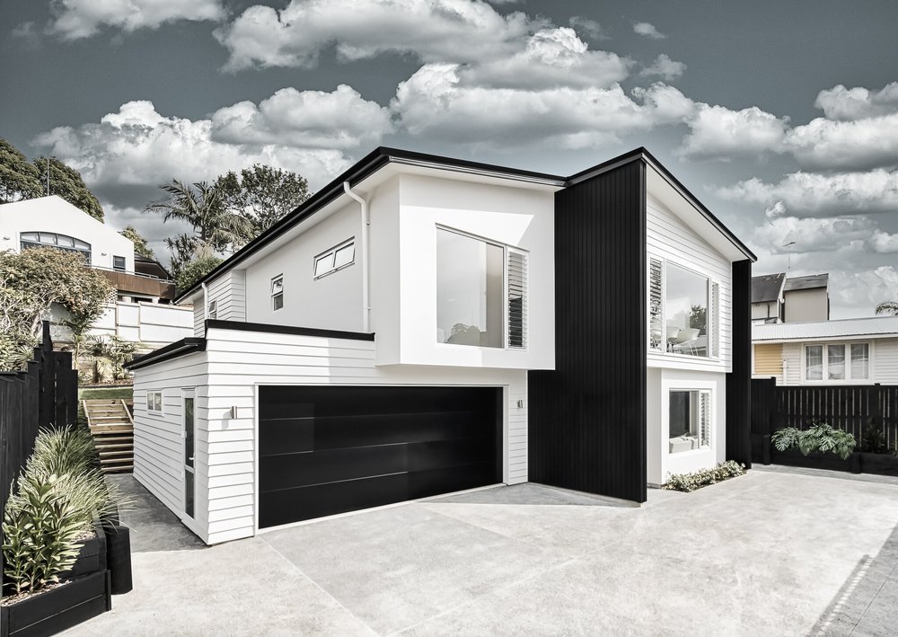 Contemporary Kohimarama house with contrasting exterior finishes.