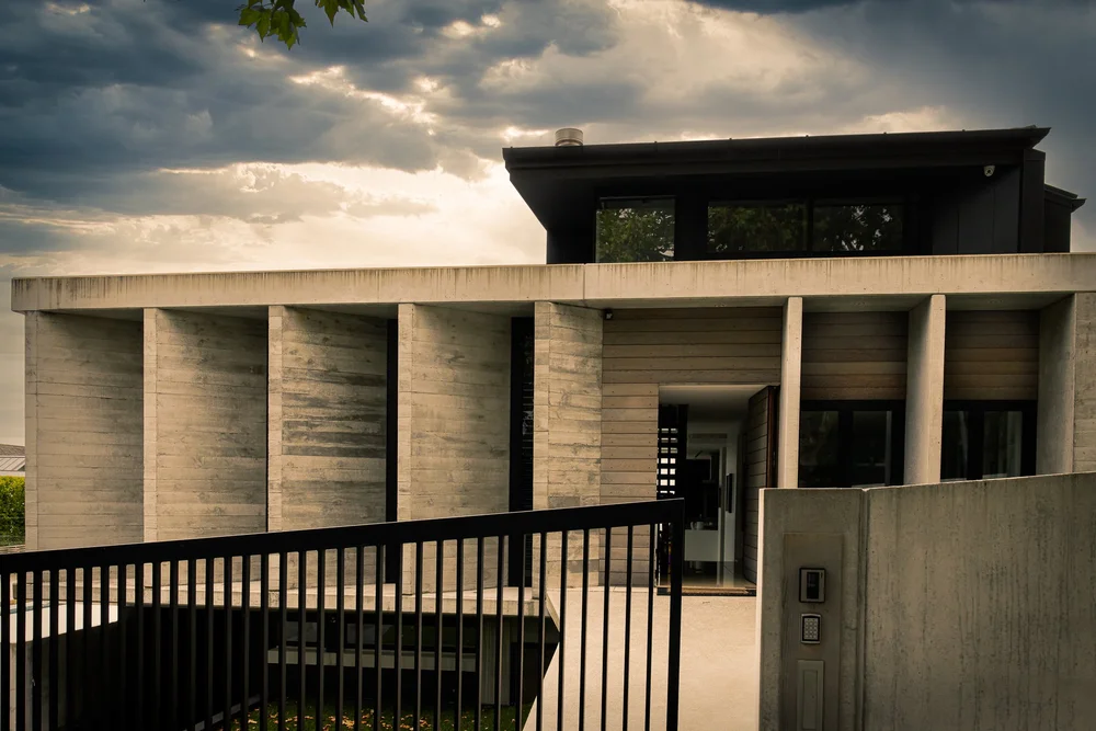 Herne Bay house exterior beneath a dramatic evening sky.