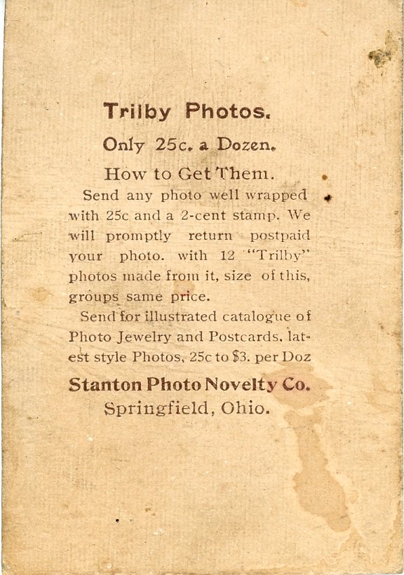 Vintage advertisement for Trilby Photos by Stanton Photo Novelty Co. from Springfield, Ohio, offering a dozen photos for 25 cents with a mail-in order process and additional catalog options.