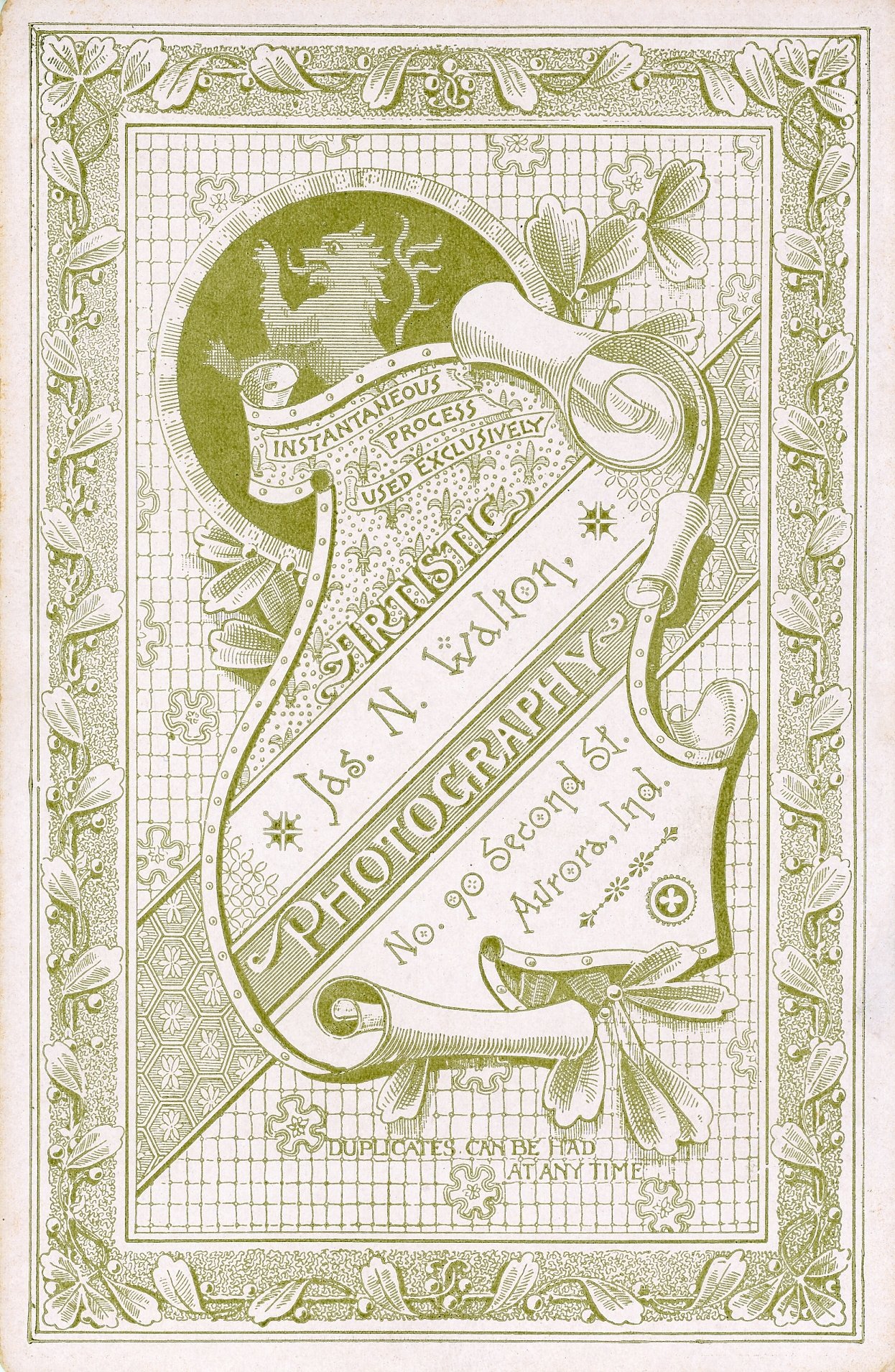 Vintage photography advertisement postcard with ornamental design and typography for an artistic photography studio.