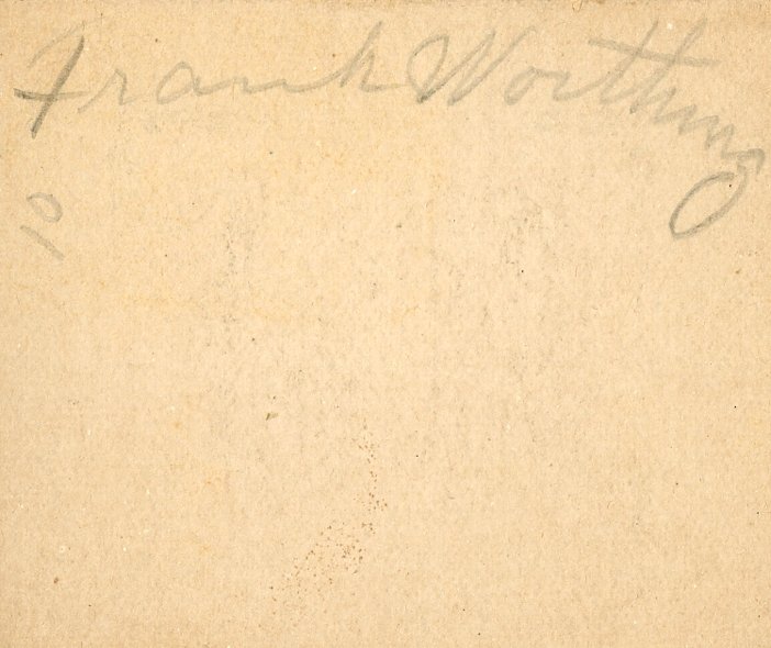 Faded paper with handwritten text "Frank Worthing" in cursive.