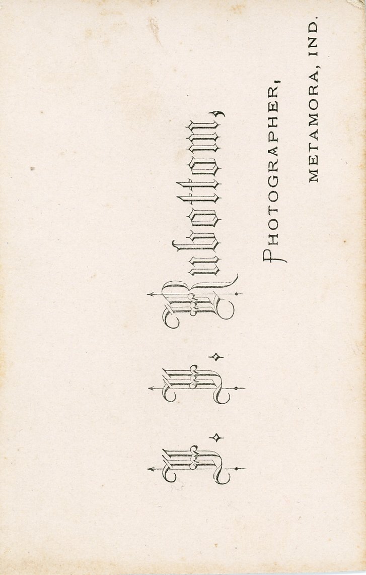 Vintage card showing "W. W. Rubottom, Photographer, Metamora, IND." in ornate lettering.