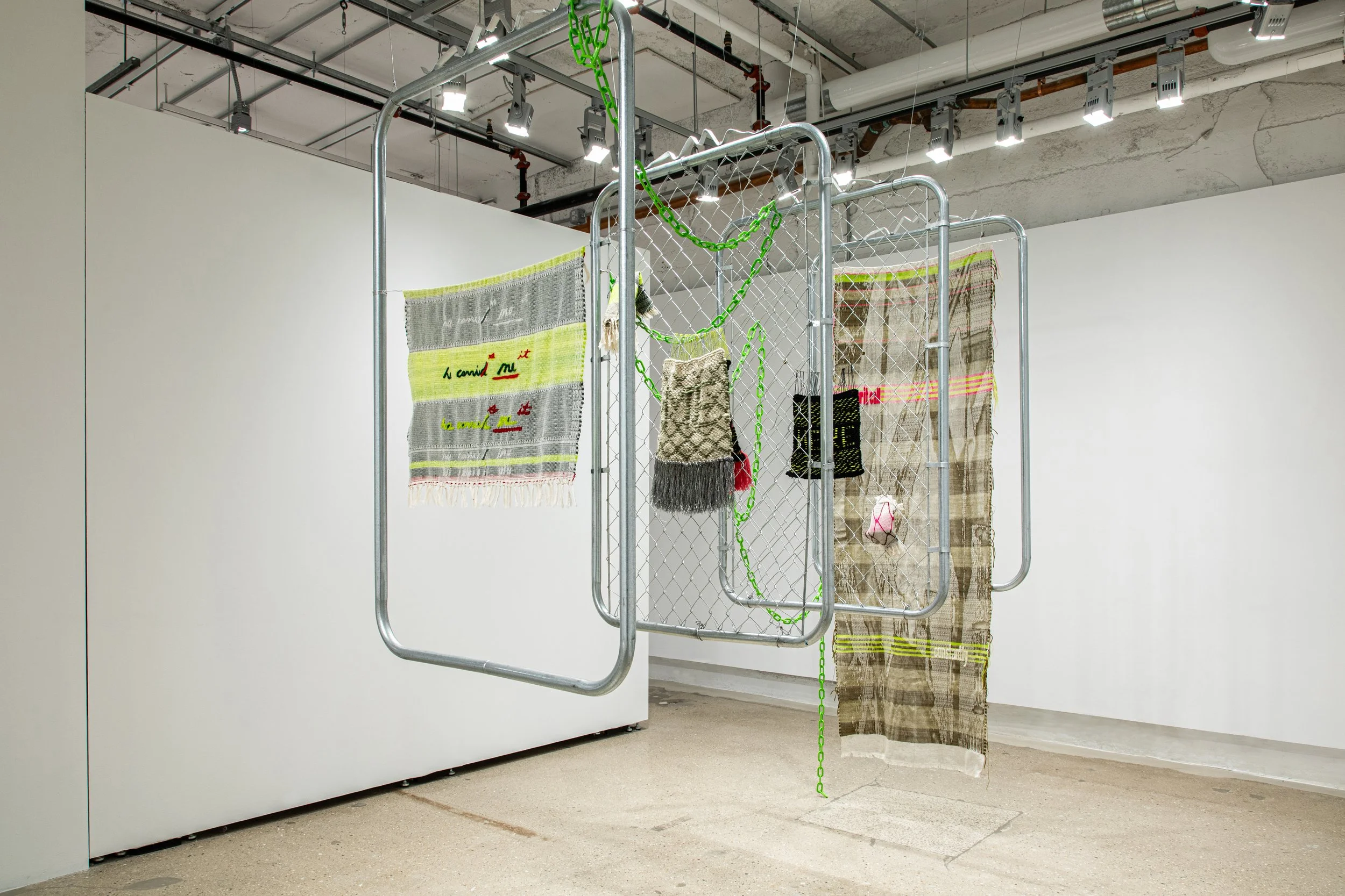 arkhē visions, 2026 

mohair, cotton, plastic chain, and chain-link fence