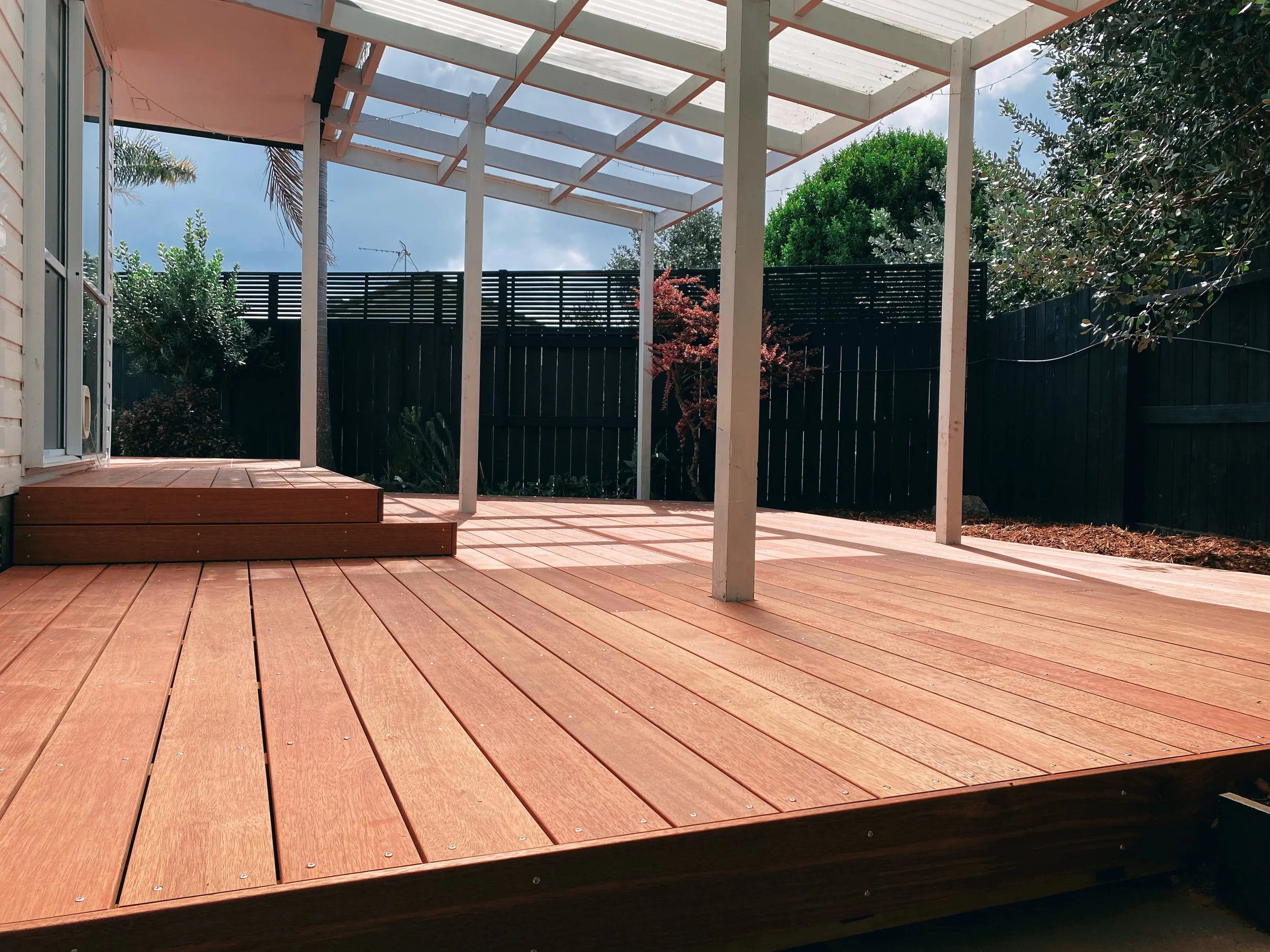 A spacious timber deck, recladded with purple heart timber. 
