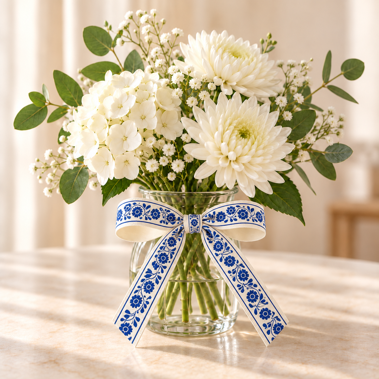 Blue floral ribbon vase arrangement-3.png