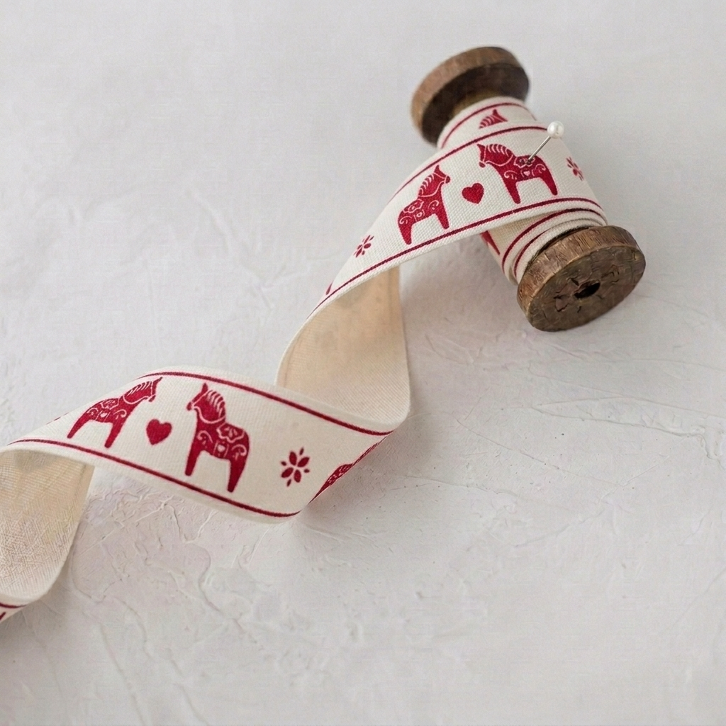 Red Dala Horse Cotton Ribbon Spool.png