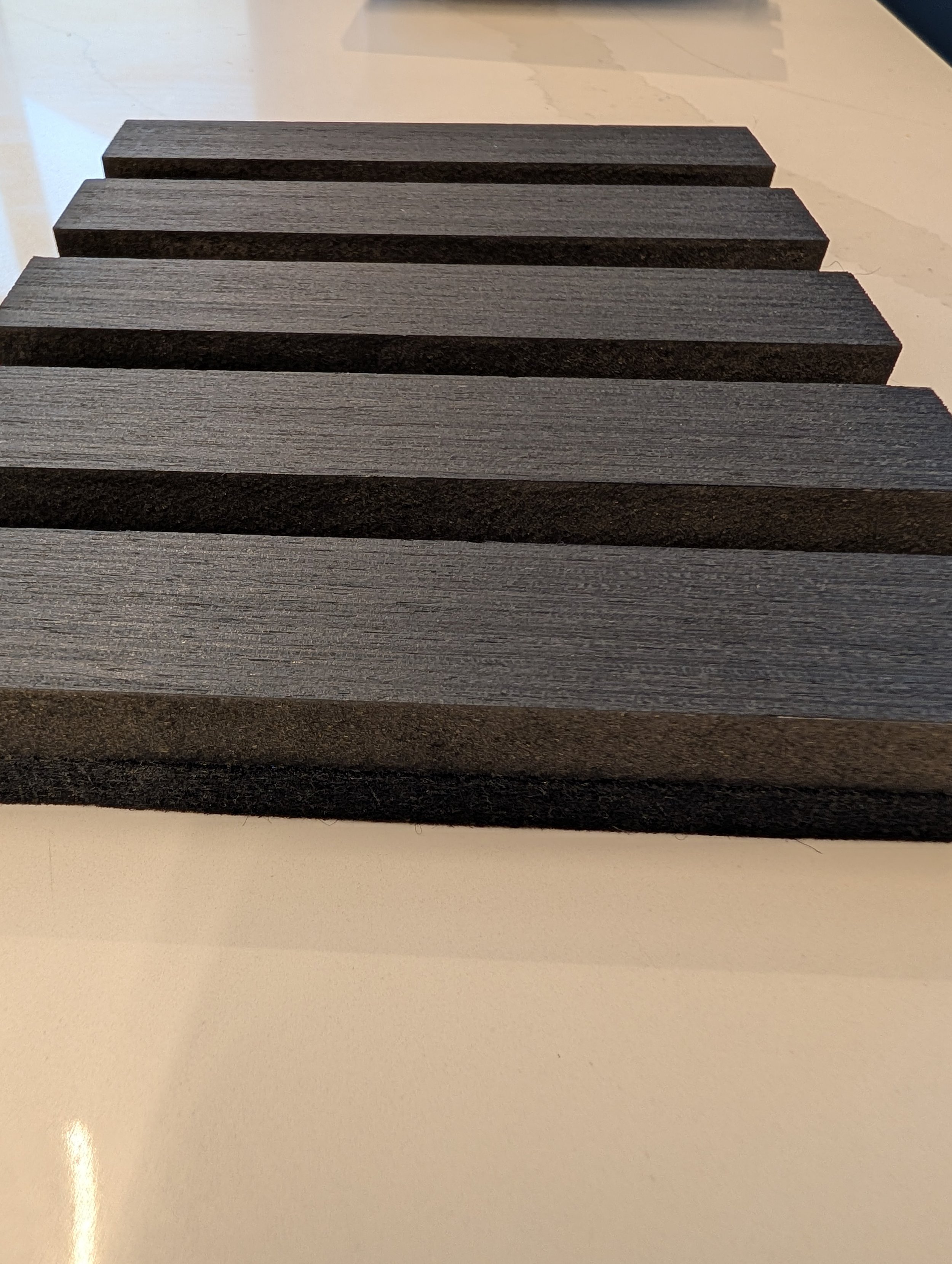 Black ebony black felt side view.jpg