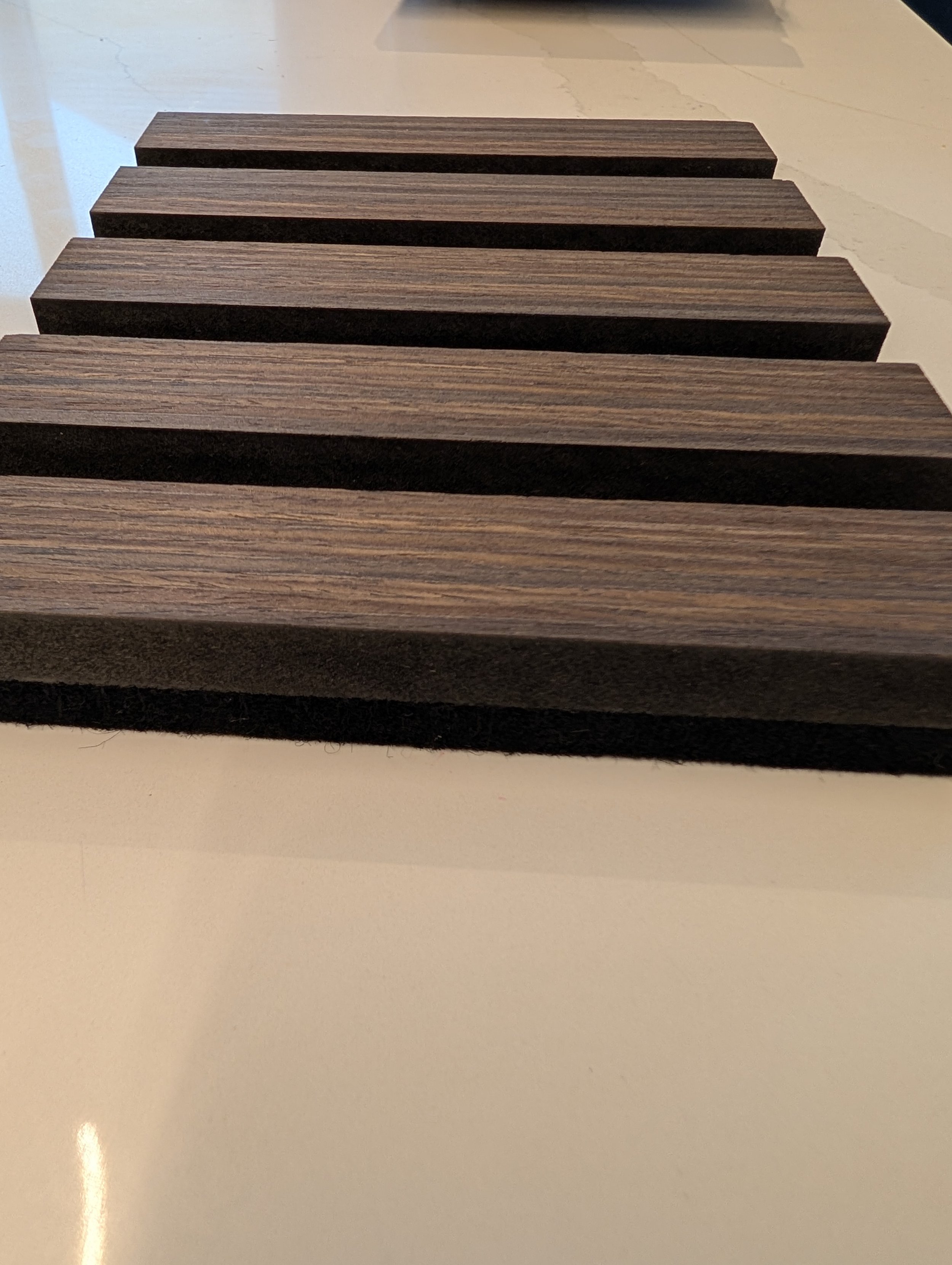 Dark walnut black felt side view.jpg