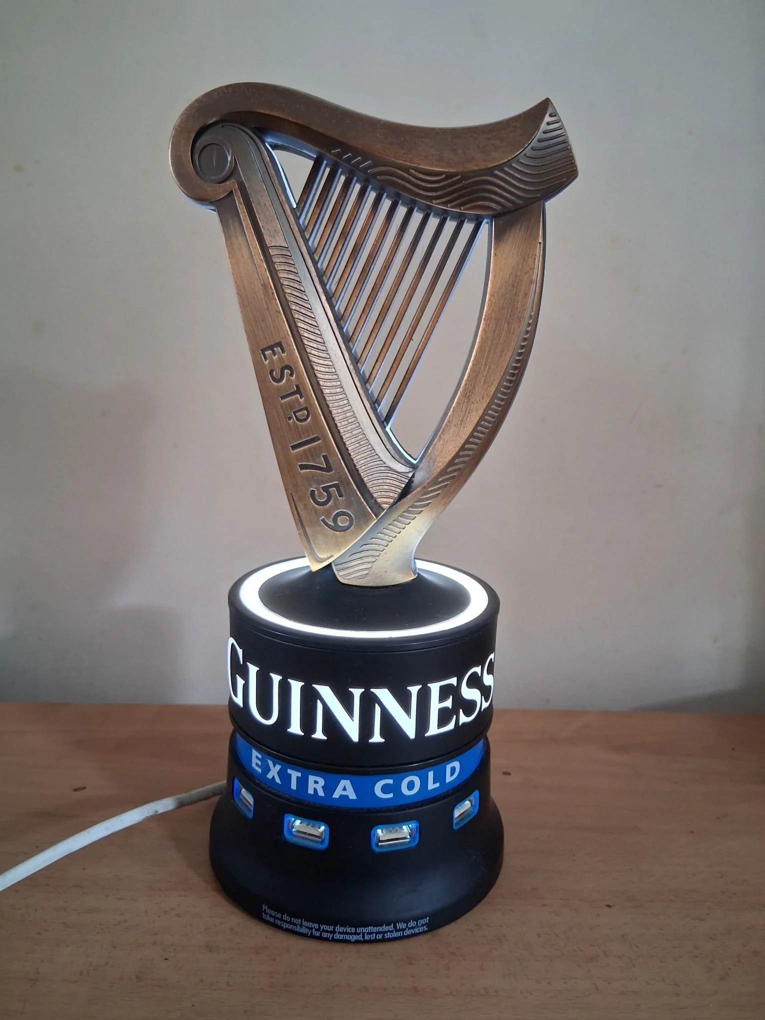 Guinness Harp illuminated USB charger display font