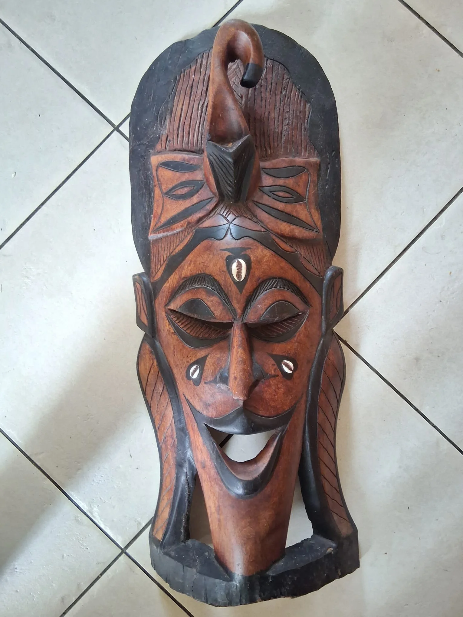 Oversized African carved wooden tribal mask,