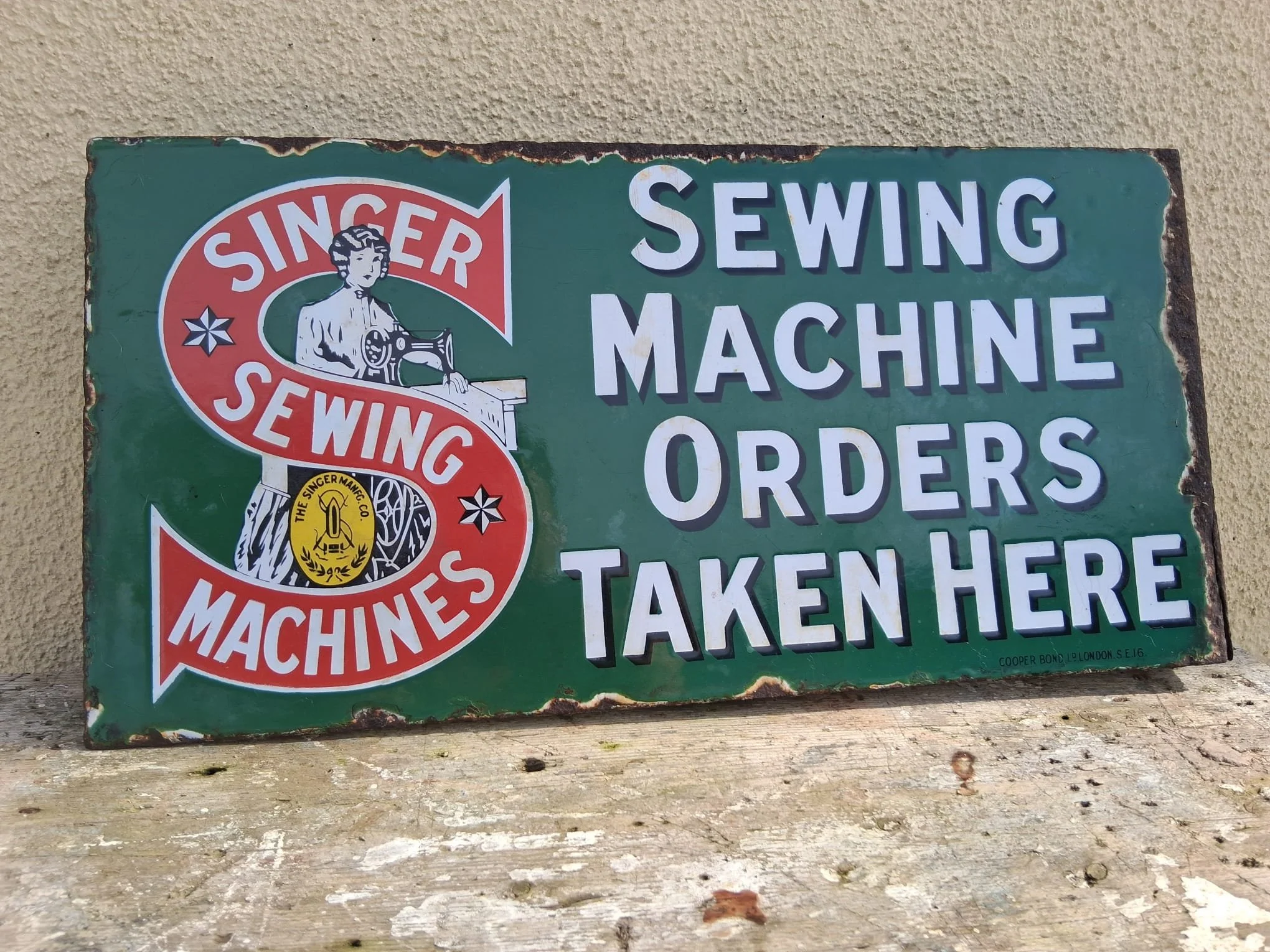 Singer Sewing Machines doublesided enamel sign