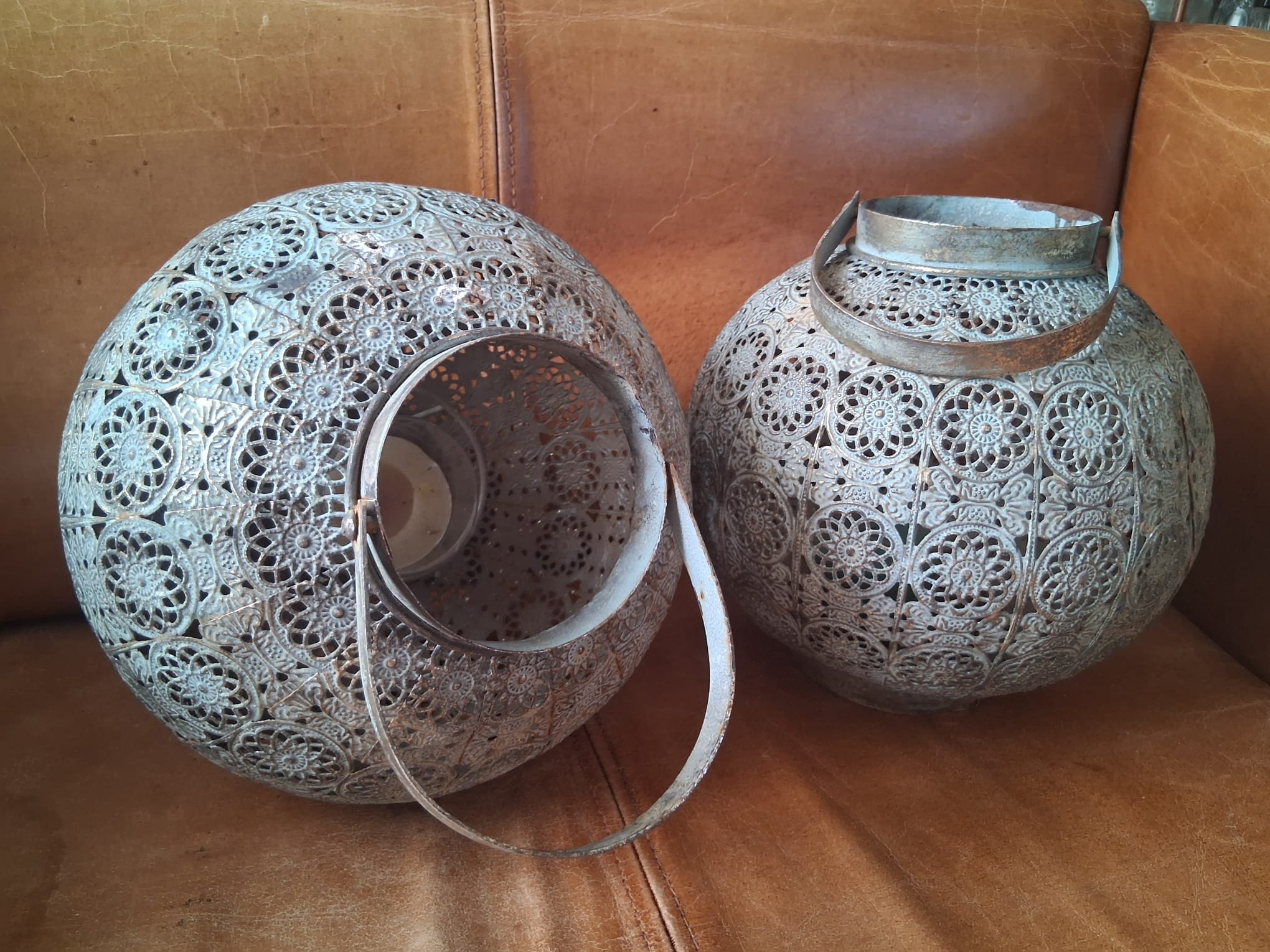Pair of highly ornate pierced Moroccan hanging basket lights
