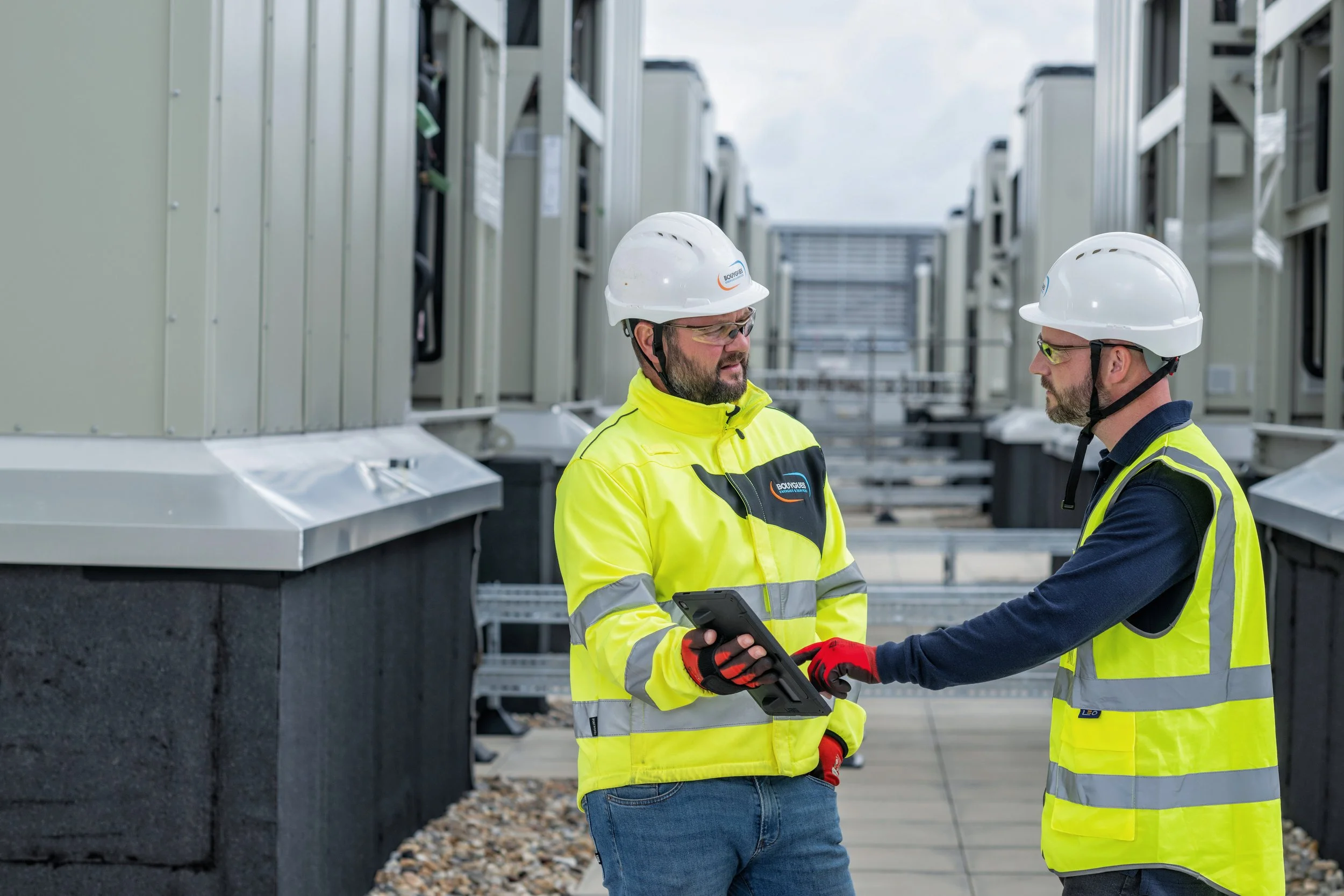Bouygues site workers conducting safety checks and inspections