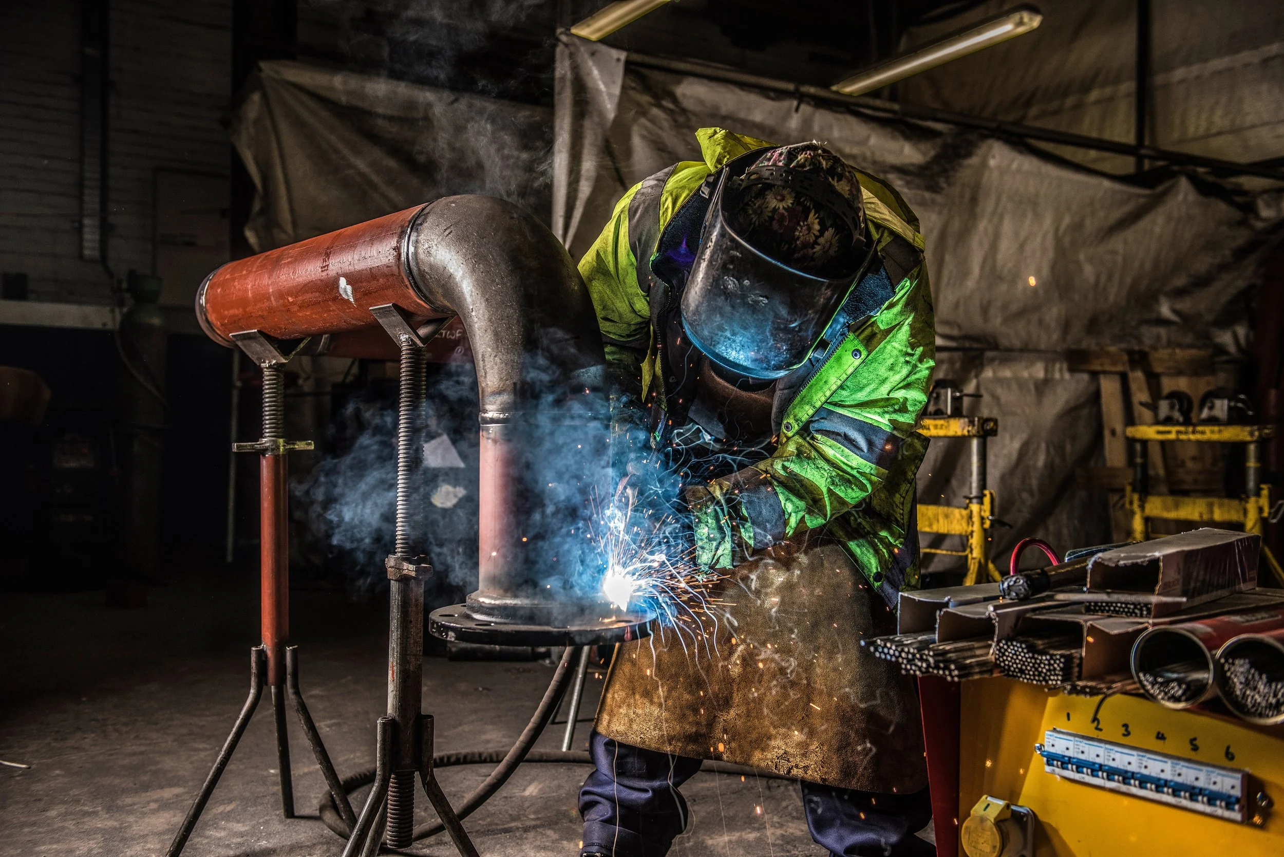 Welder at work at JCB Stockport