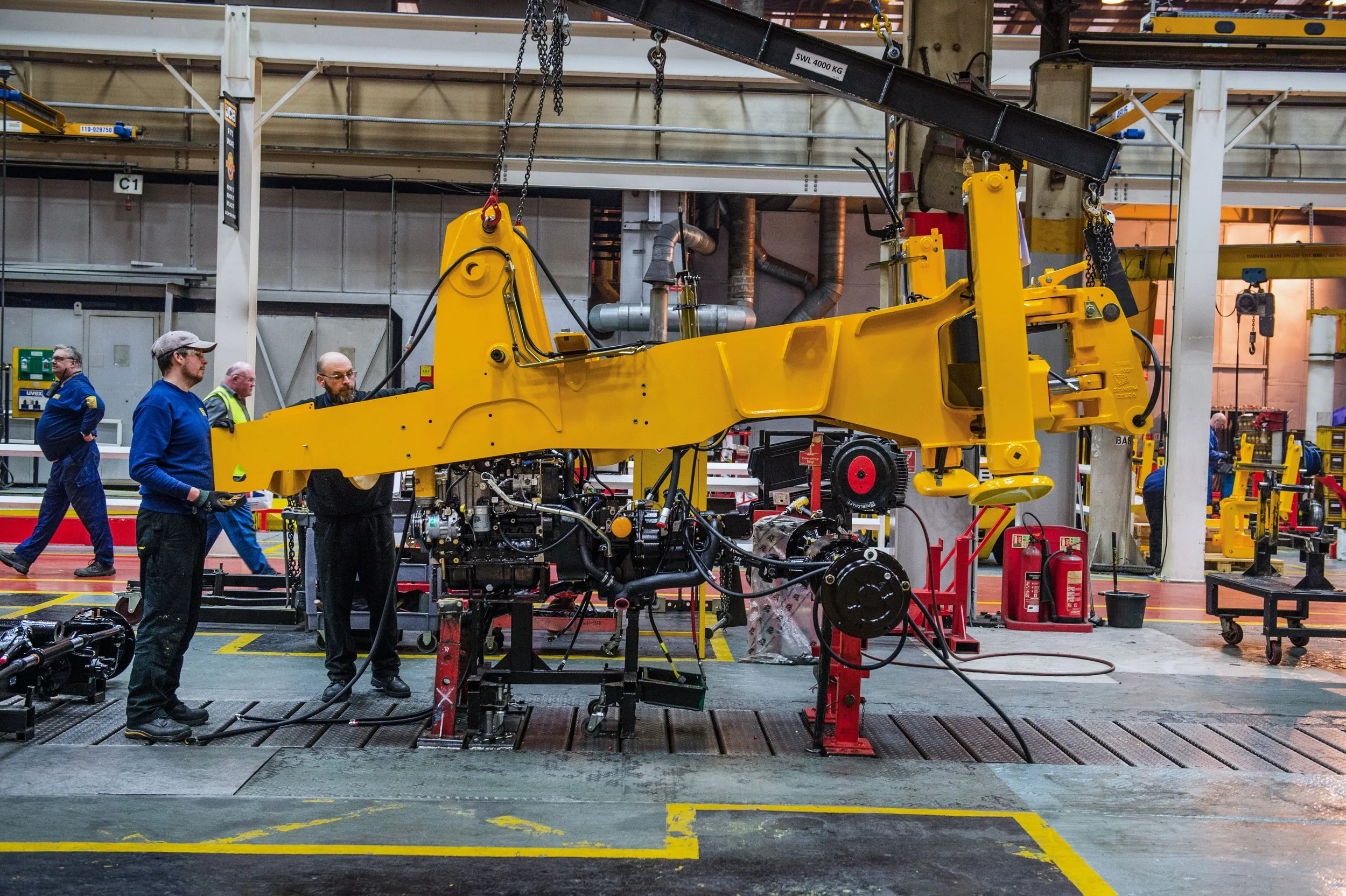 Industrial site in Stockport featuring JCB construction equipment