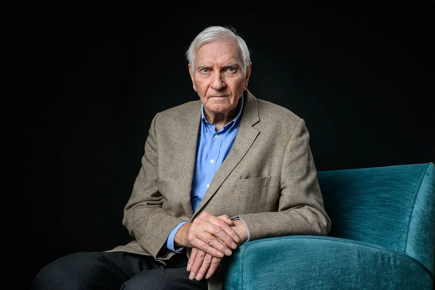 Portrait of Harvey Proctor in hotel room in York