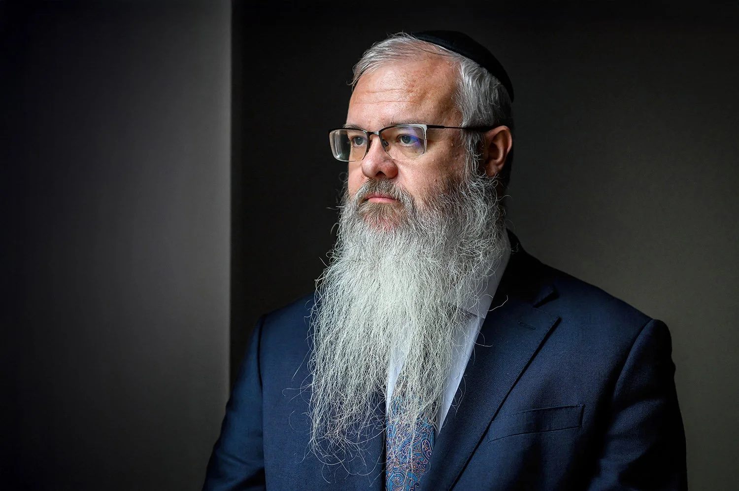 Portrait of Rabbi Daniel Walker inside synagogue