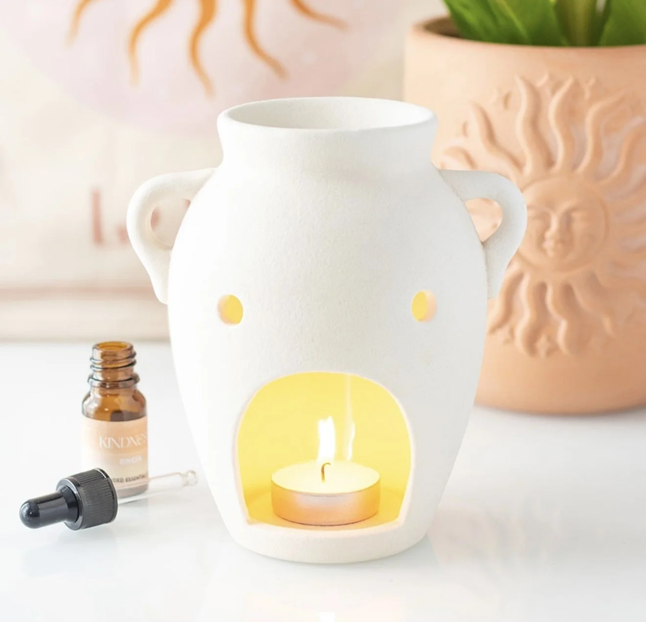 Golden hour vase shaped burner