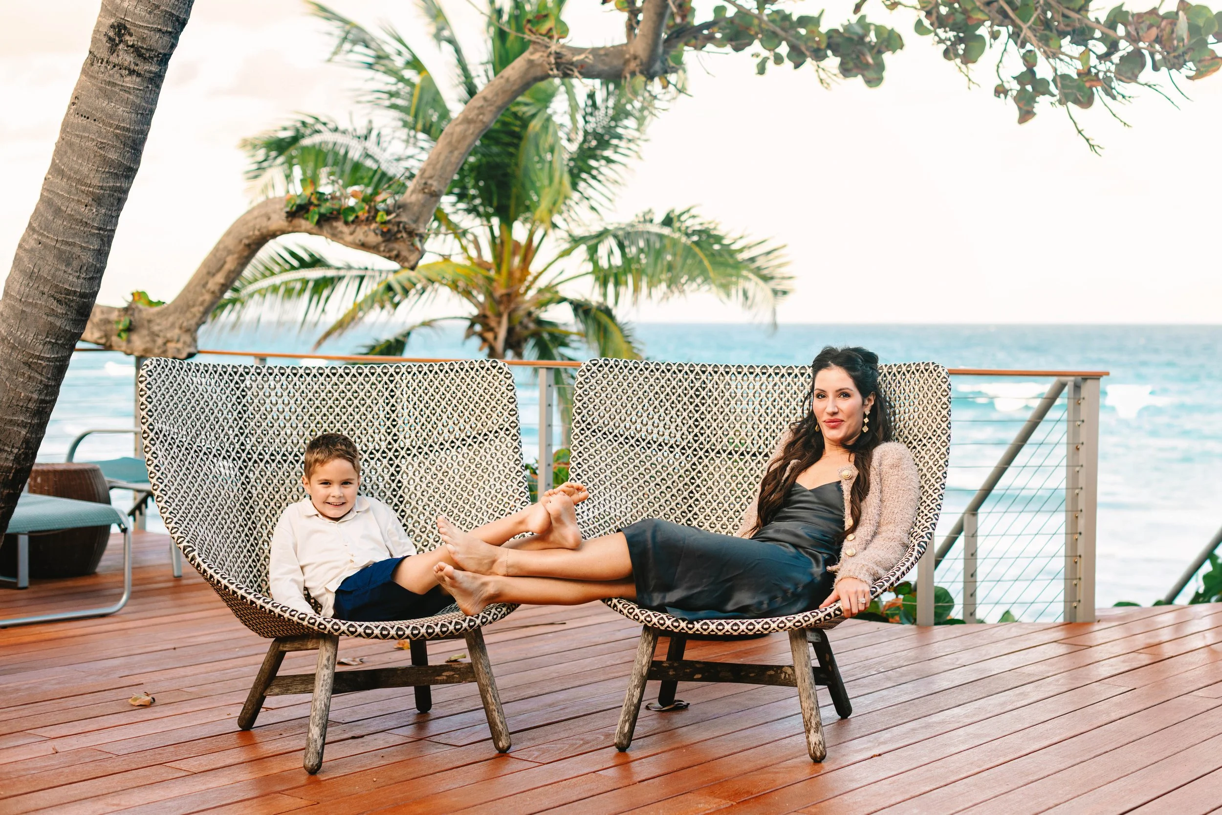 Family photographed outside their beachfront home during a Delray Beach family session