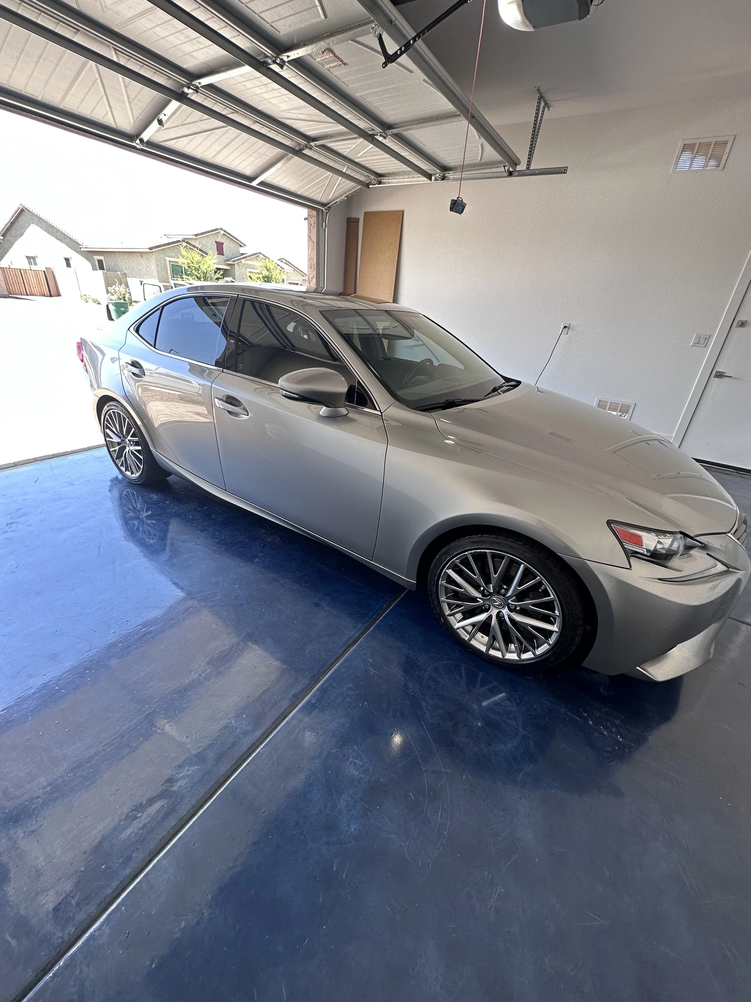 Lexus sedan in garage after complete detail to start a maintenance program in Goodyear, AZ