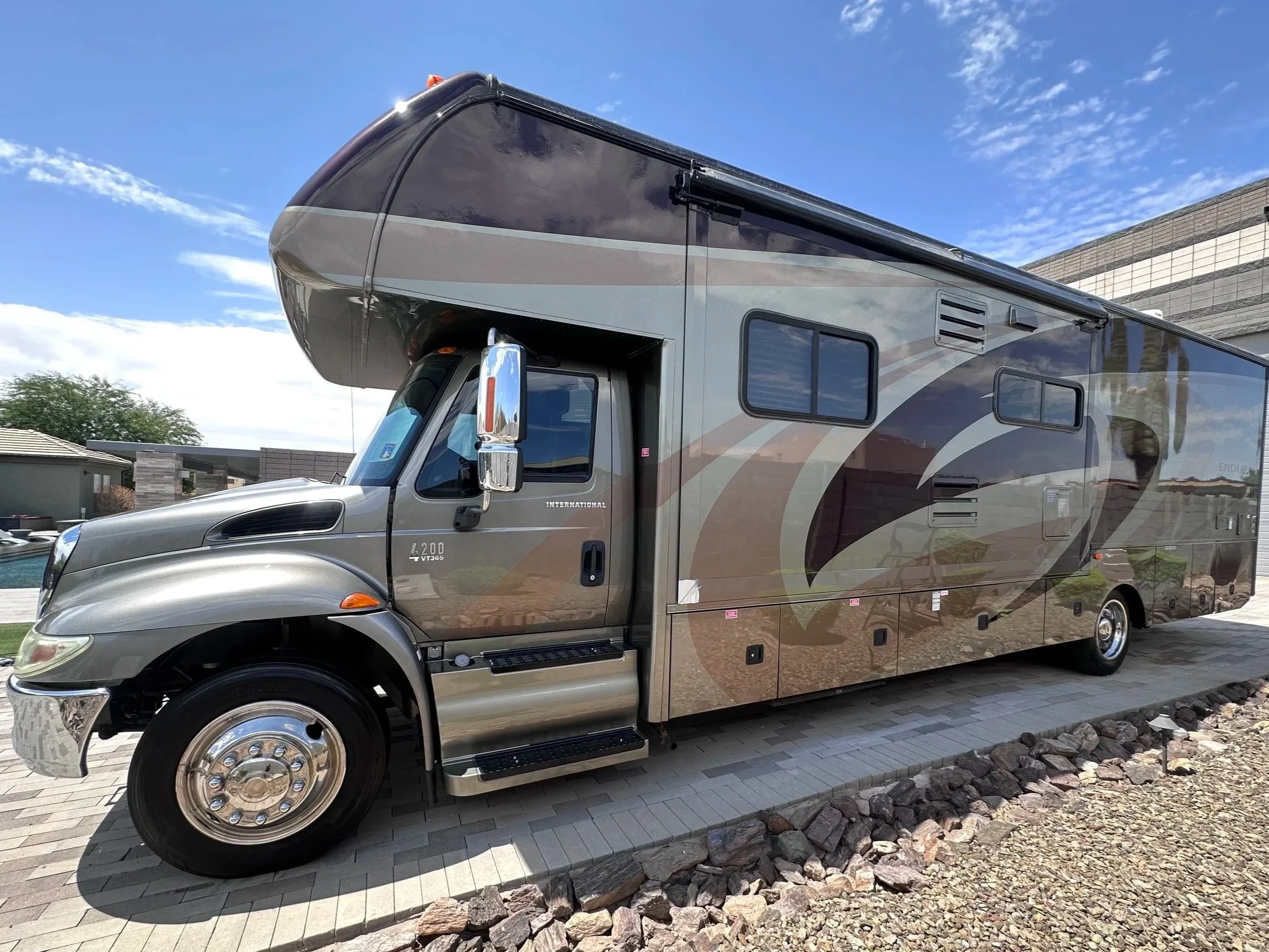 Super C Class motorhome after an exterior detail and paint sealant service in Peoria, AZ