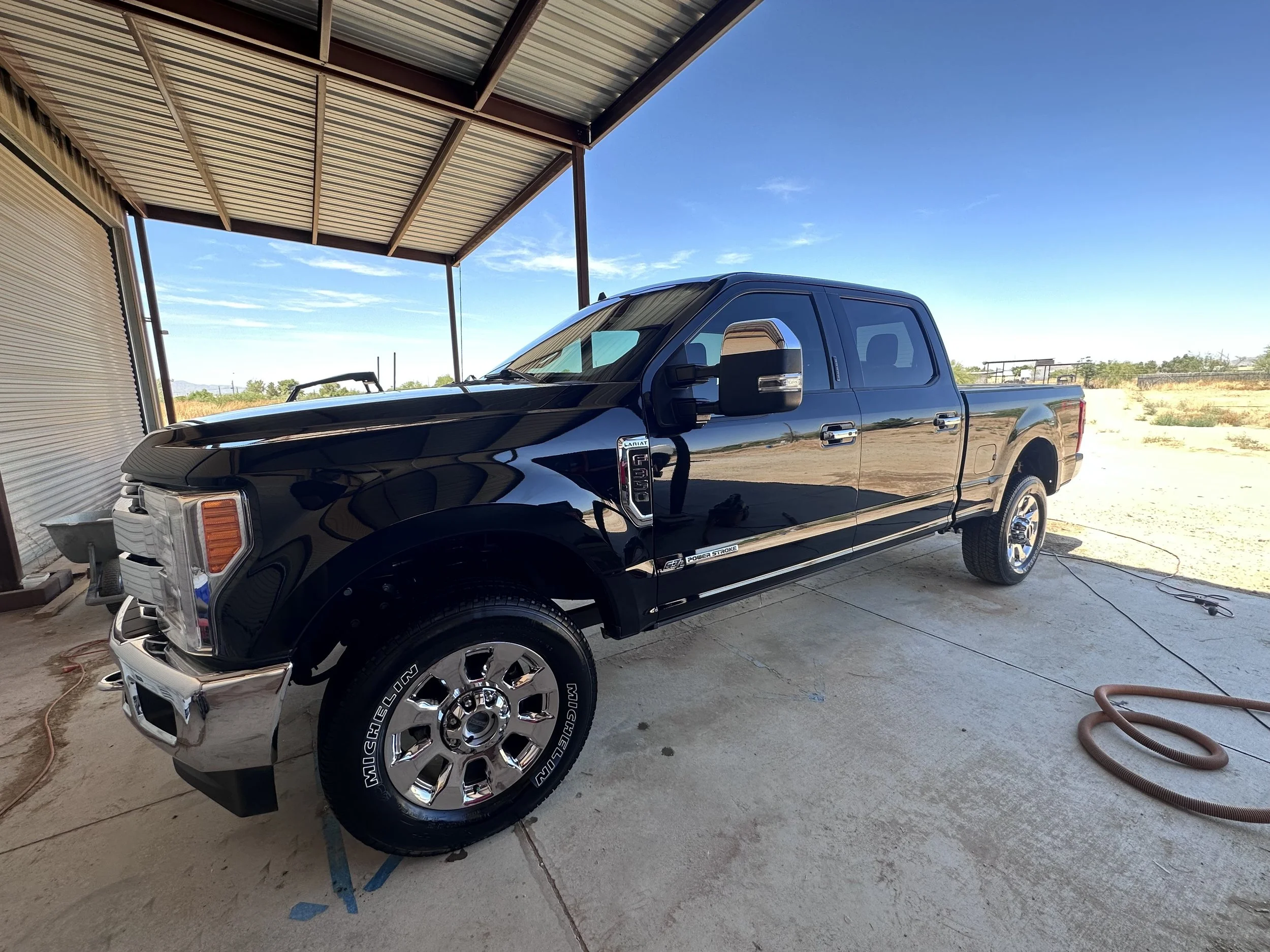 Black F250 shining and dust free after a maintenance detail in Buckeye, AZ