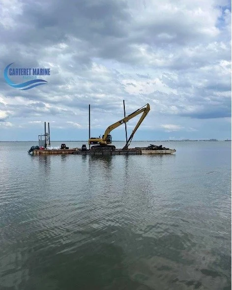 🚧 Behind the Scenes at Bay Run 🚧

Another productive day on the water! Our crew continued demolition efforts and loaded debris onto transport barges, keeping the project moving forward safely and efficiently.

#CarteretMarineServices #MarineConstru