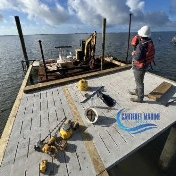 🔨 Behind the Scenes at 305 Bay Run!

A look at the work happening behind the scenes as our crew continues making progress on the waterfront. From assembling and securing the long girder to setting pilings, adjusting them to the proper height, and in