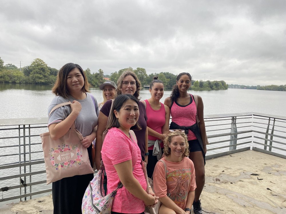 Walk With Your Breasties participants smiling together at the Lady Bird Lake overlook