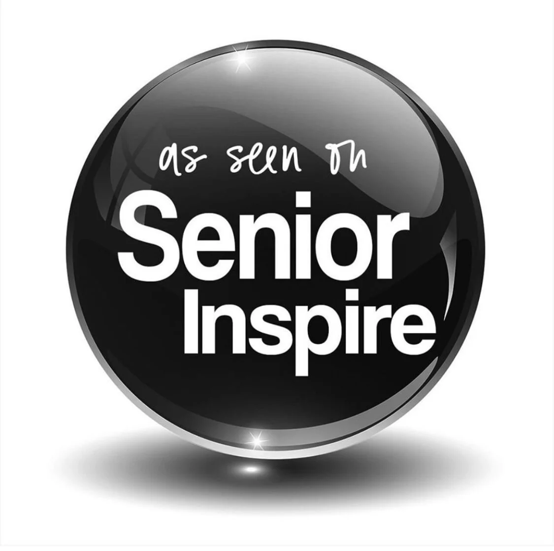 A black and silver circular badge with the words 'as seen in Senior Inspire' in white text.