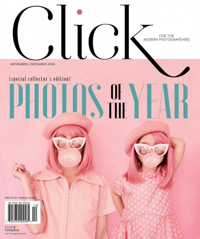 Cover of Click magazine, November/December 2020, featuring two women with pink hair and bubblegum, dressed in pink clothing and large pink sunglasses, against a pink background. The title reads "Photos of the Year" with the magazine's tagline for mod