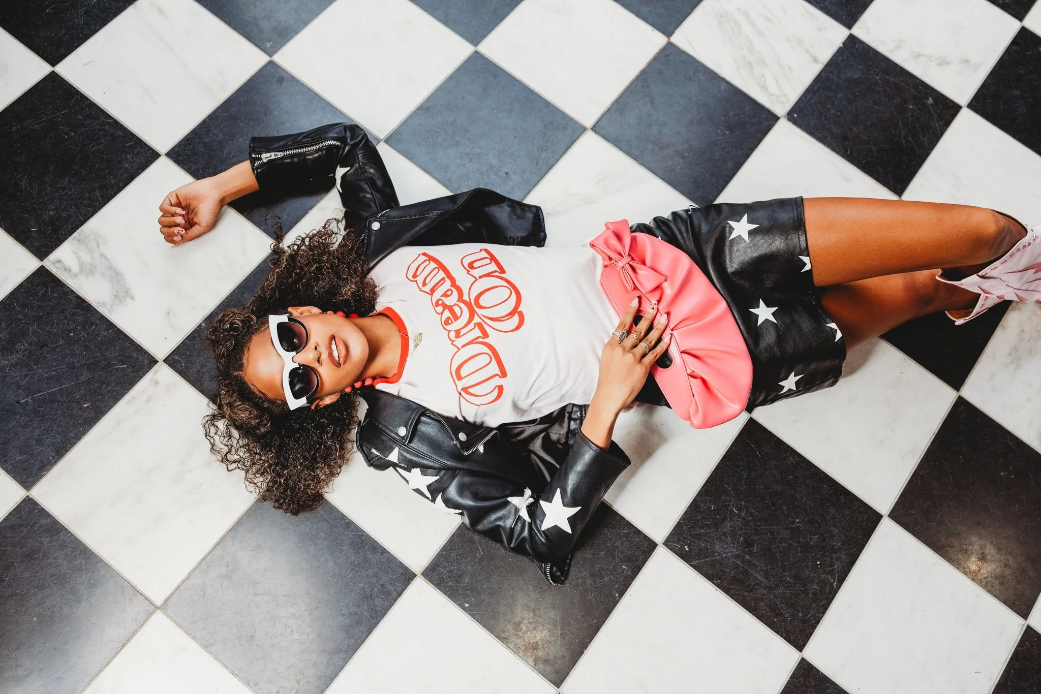 Editorial style senior portraits photographed in Sacramento with creative fashion styling