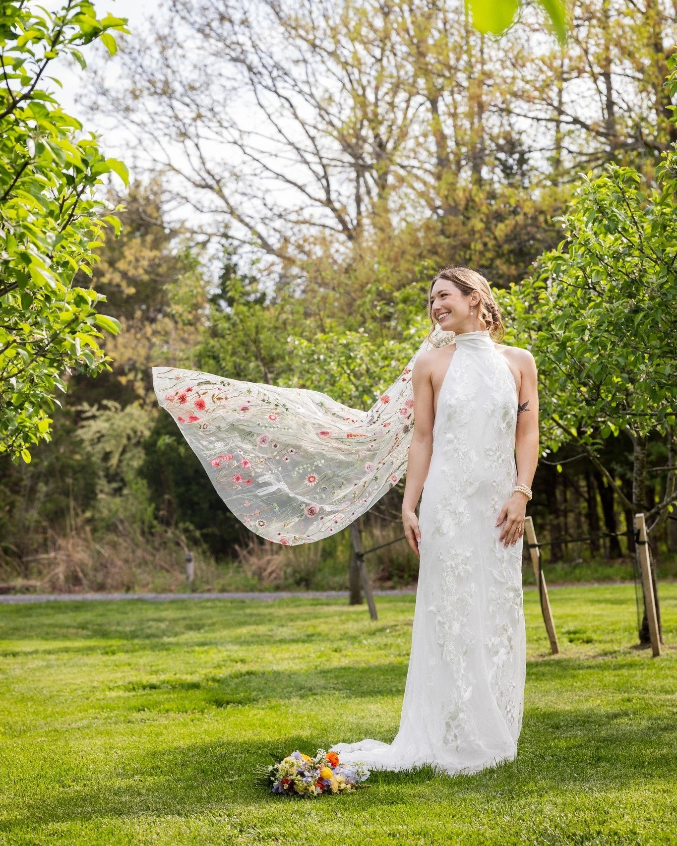 🌸 Gabi and Tyler&rsquo;s wedding may have wrapped earlier this month, but we have a feeling we&rsquo;ll be sharing photos from this one for a long time. First things first: can we talk about this veil?

The floral embroidery, the color, the way it c