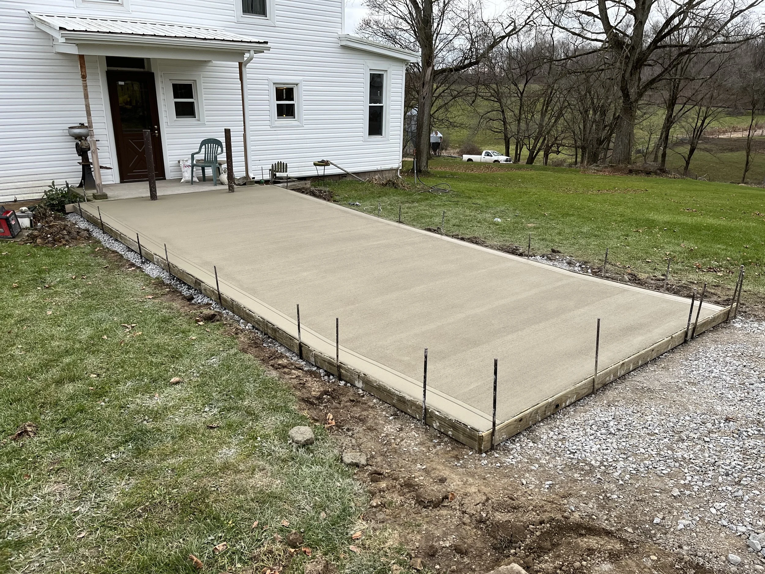Concrete ADA side view sidewalk and parking pad.jpg
