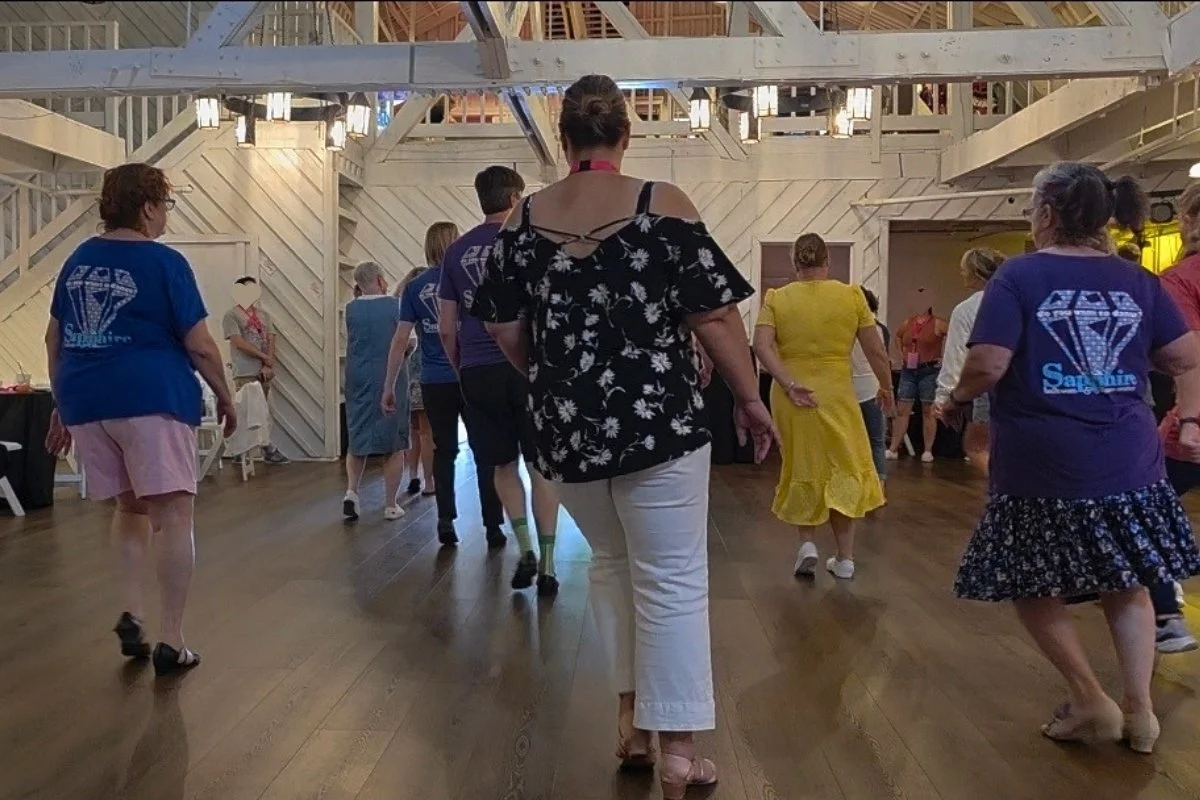 Guests learning dances to songs from Dirty Dancing during a dance lesson at Mountain Lake Lodge