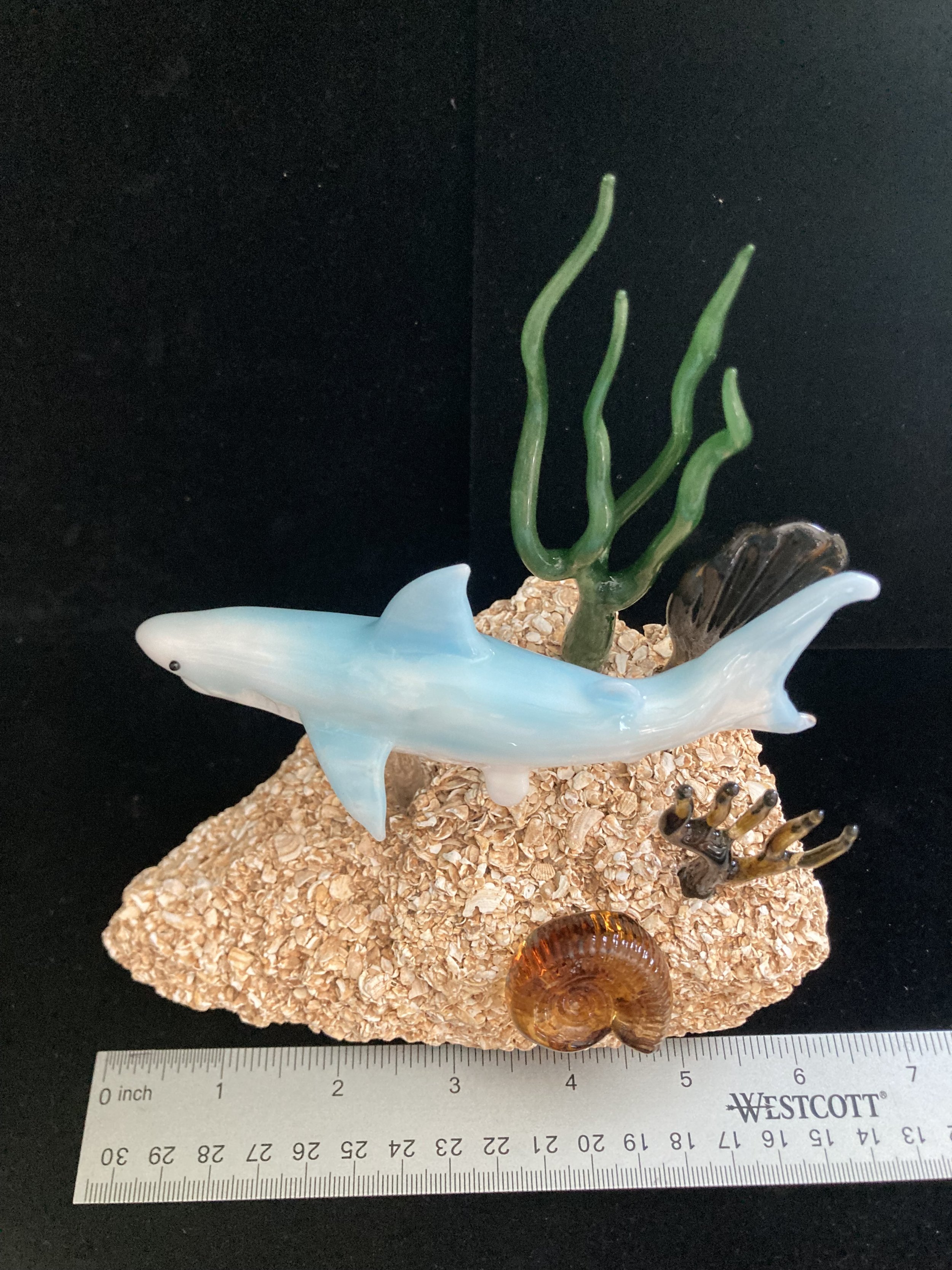Blue Shark Sculpture on Coquina