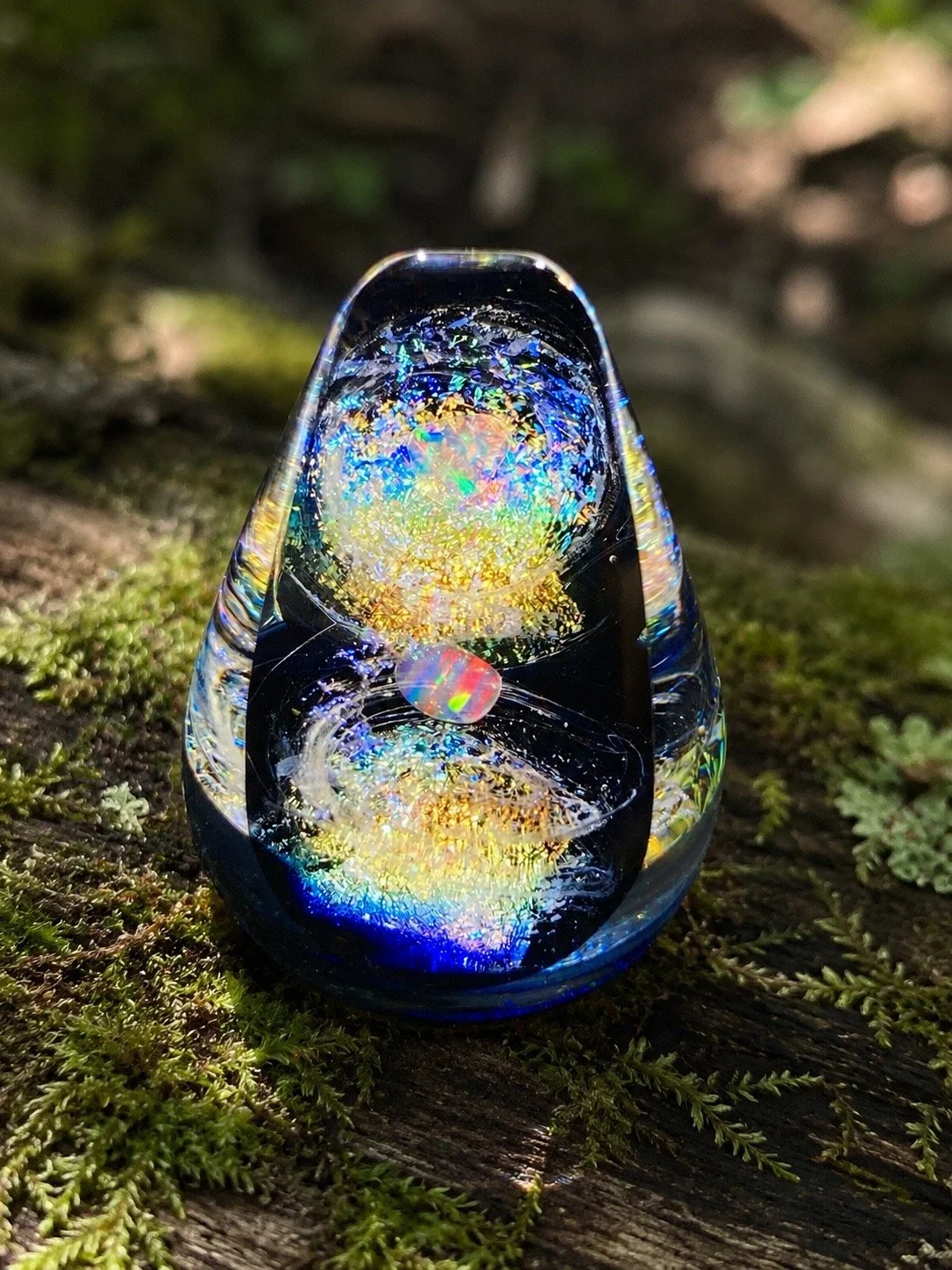 Reflections memorial sculpture displaying shifting light, color, and depth through handcrafted glass artistry