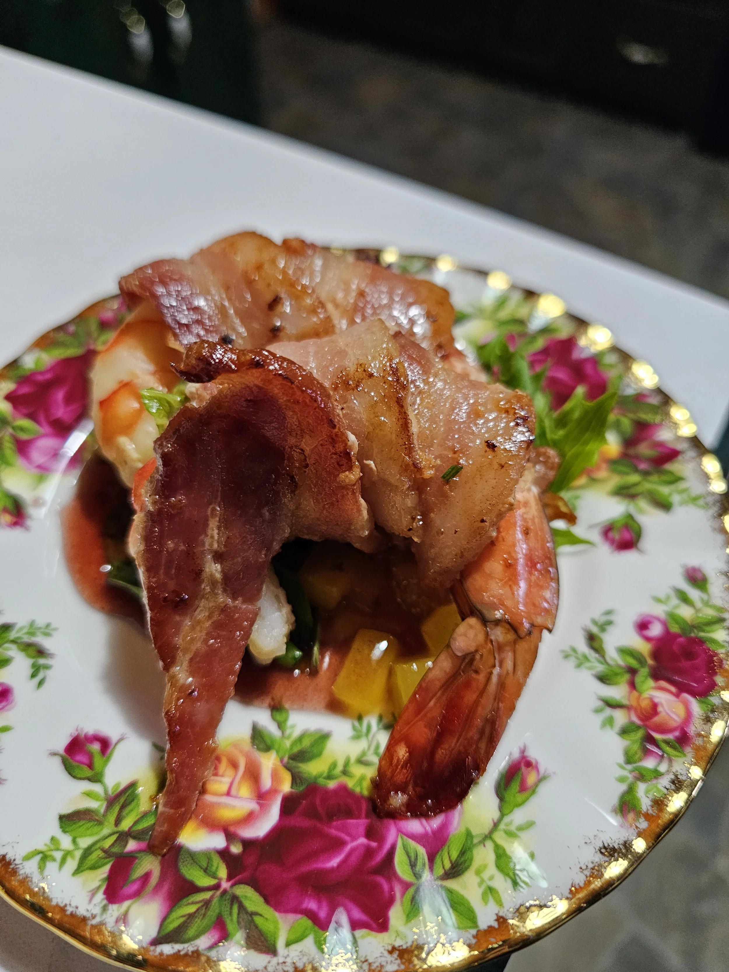 Close up photo of bacon-wrapped shrimp