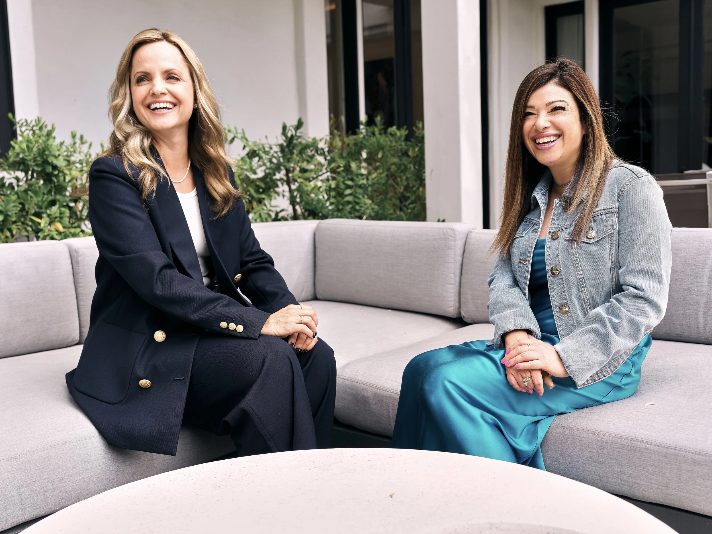 Mena Suvari and stylist Nola Singer pose at a private home in Los Angeles.