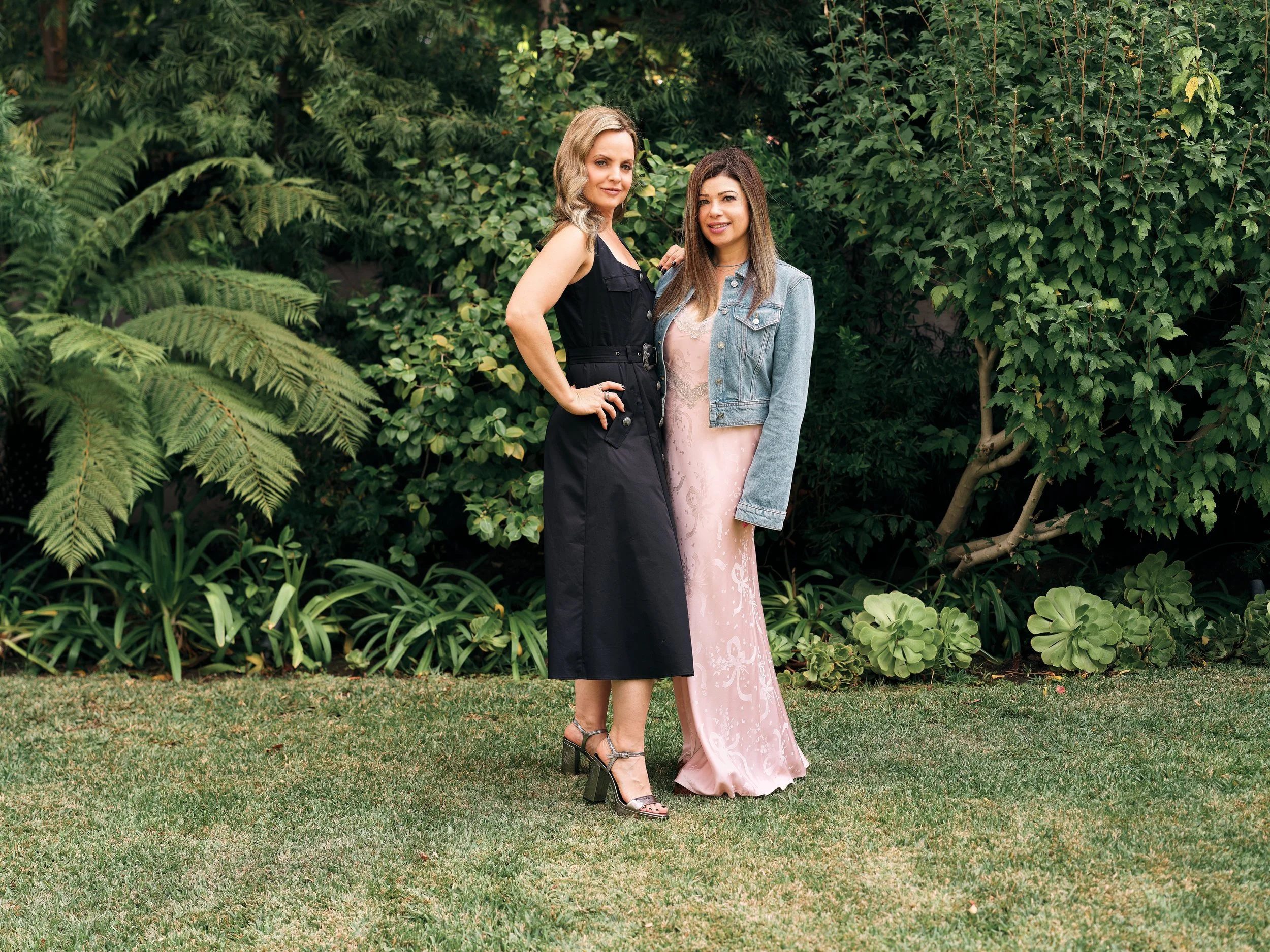 Mena Suvari and stylist Nola Singer pose at a private home in Los Angeles.
