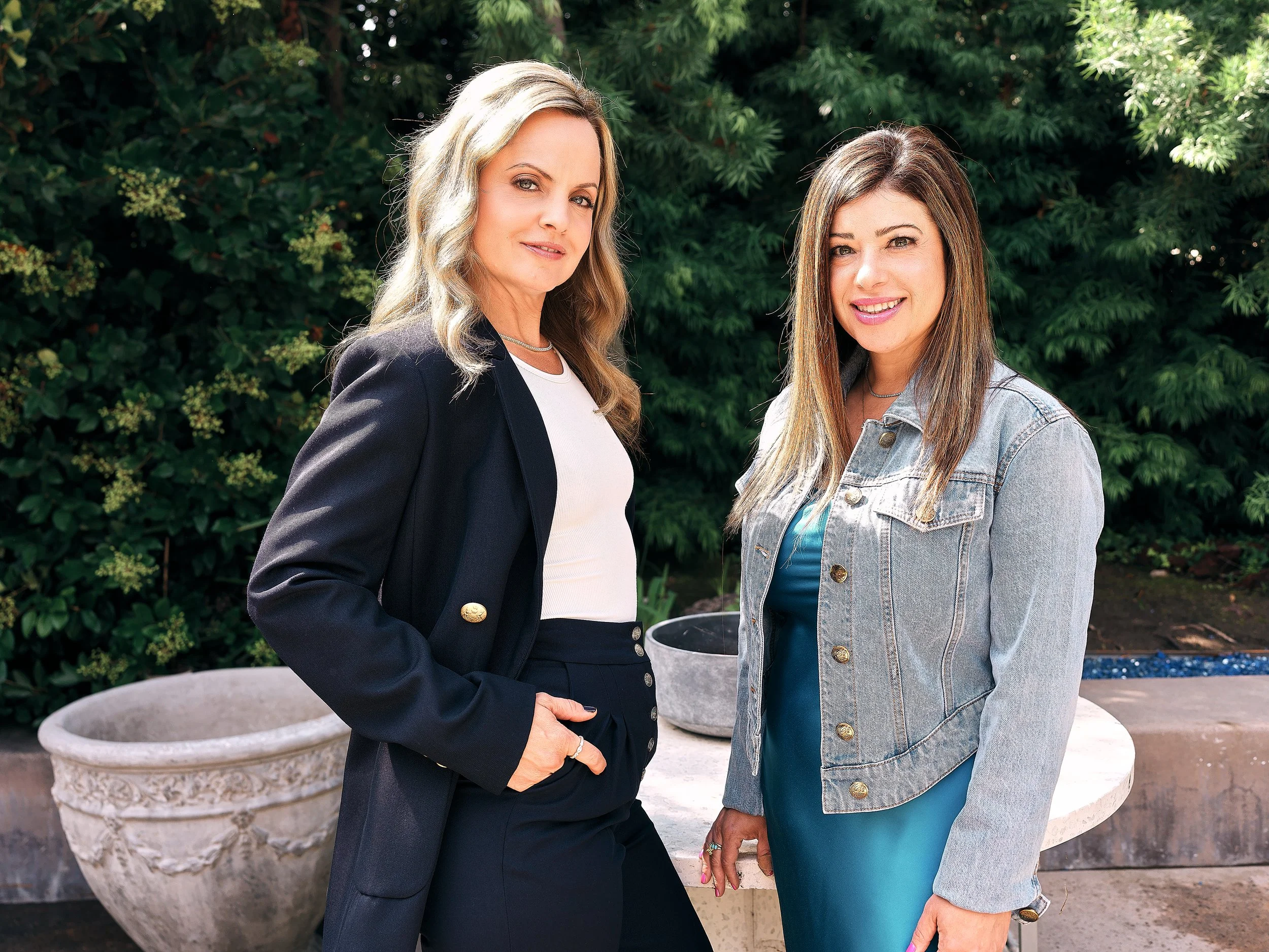 Mena Suvari and stylist Nola Singer pose at a private home in Los Angeles.