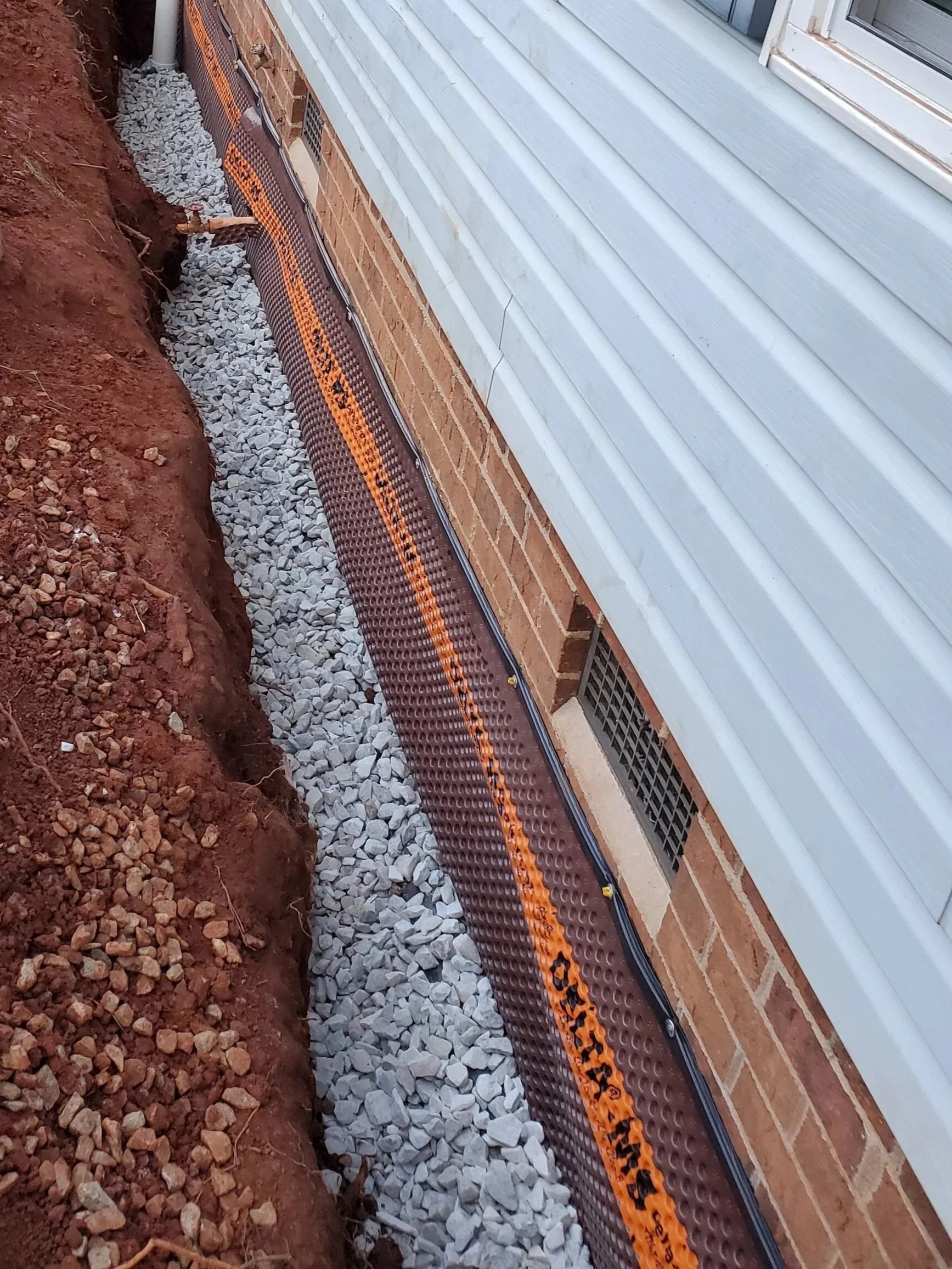 French drain and crawl space water management