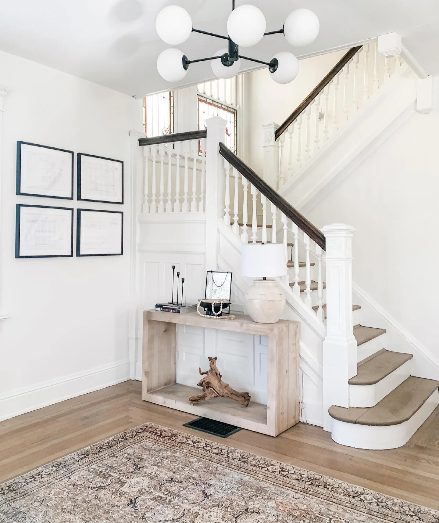 Happy Saturday! It&rsquo;s a beautiful morning here in Cincinnati. 

I realize I haven&rsquo;t shared much of my foyer area, so let&rsquo;s do it now! The original details (hello wainscoting and stained glass windows!) in the steps &amp; landing area
