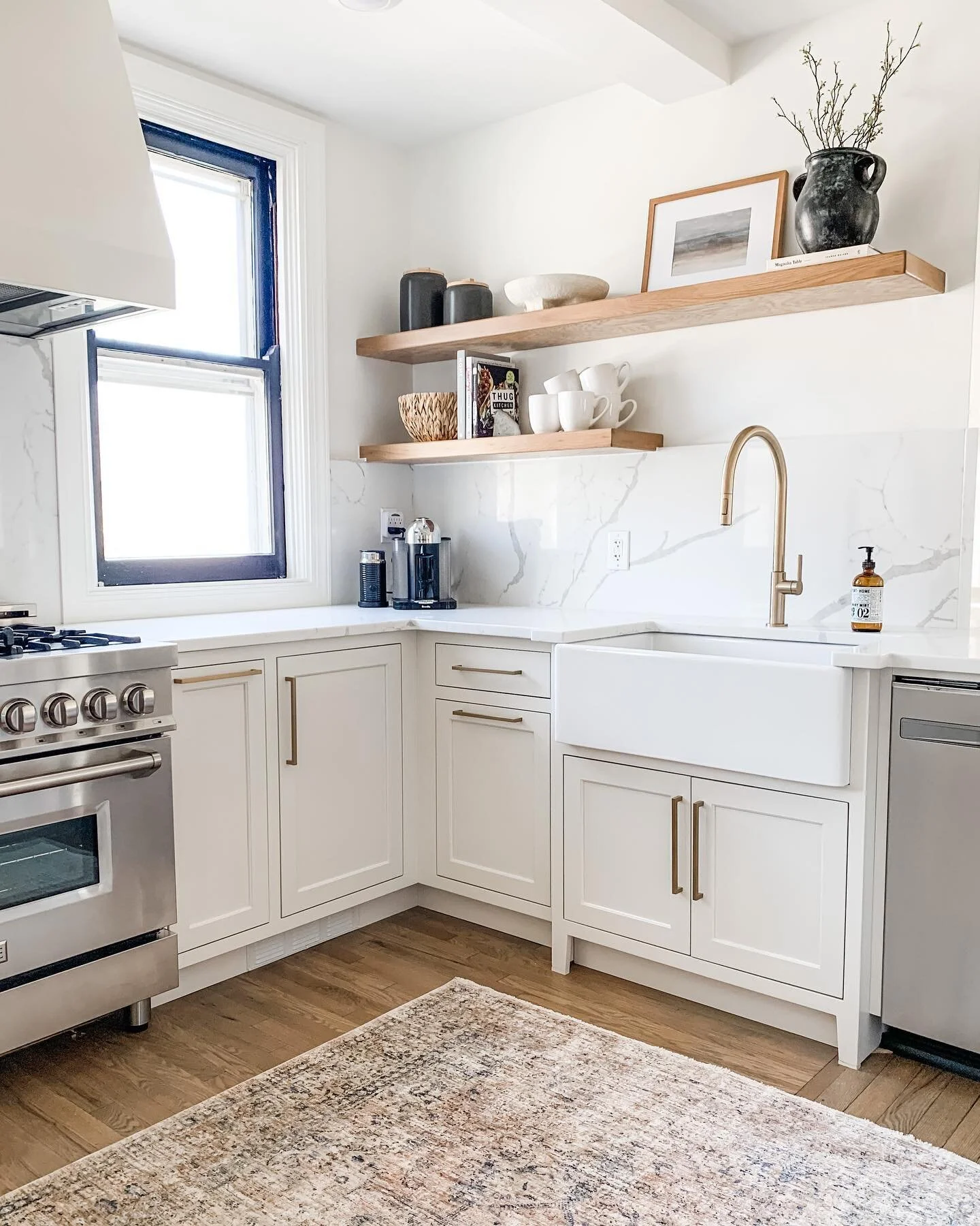 Happy Friday! I am excited to finally reveal to you guys our big kitchen transformation! 

This was not an easy project by any means, but well worth the work that went into it. We completely reconfigured this kitchen, first by removing a huge chimney