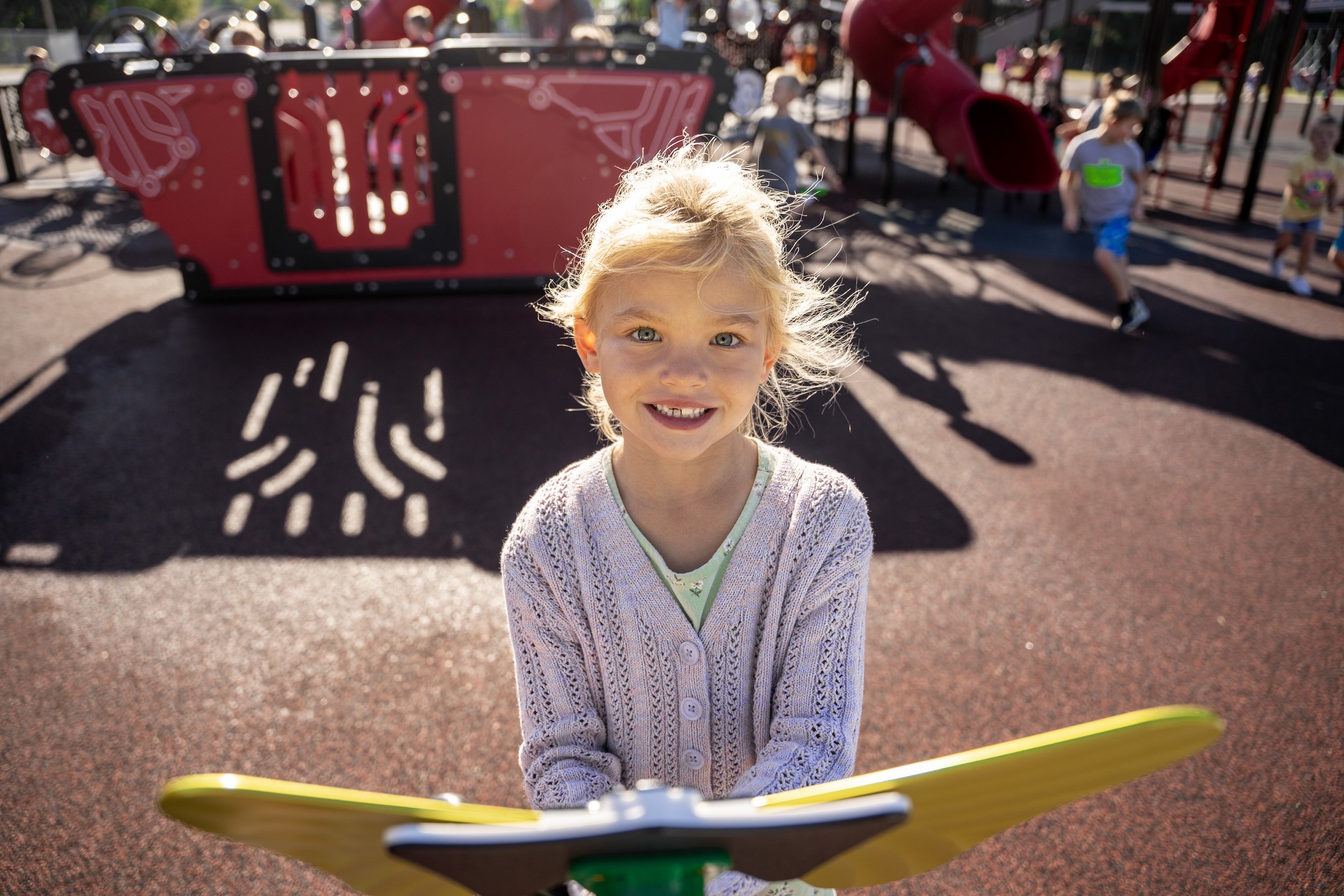 24girl playing at playground, musical instrument, playground photography.jpg