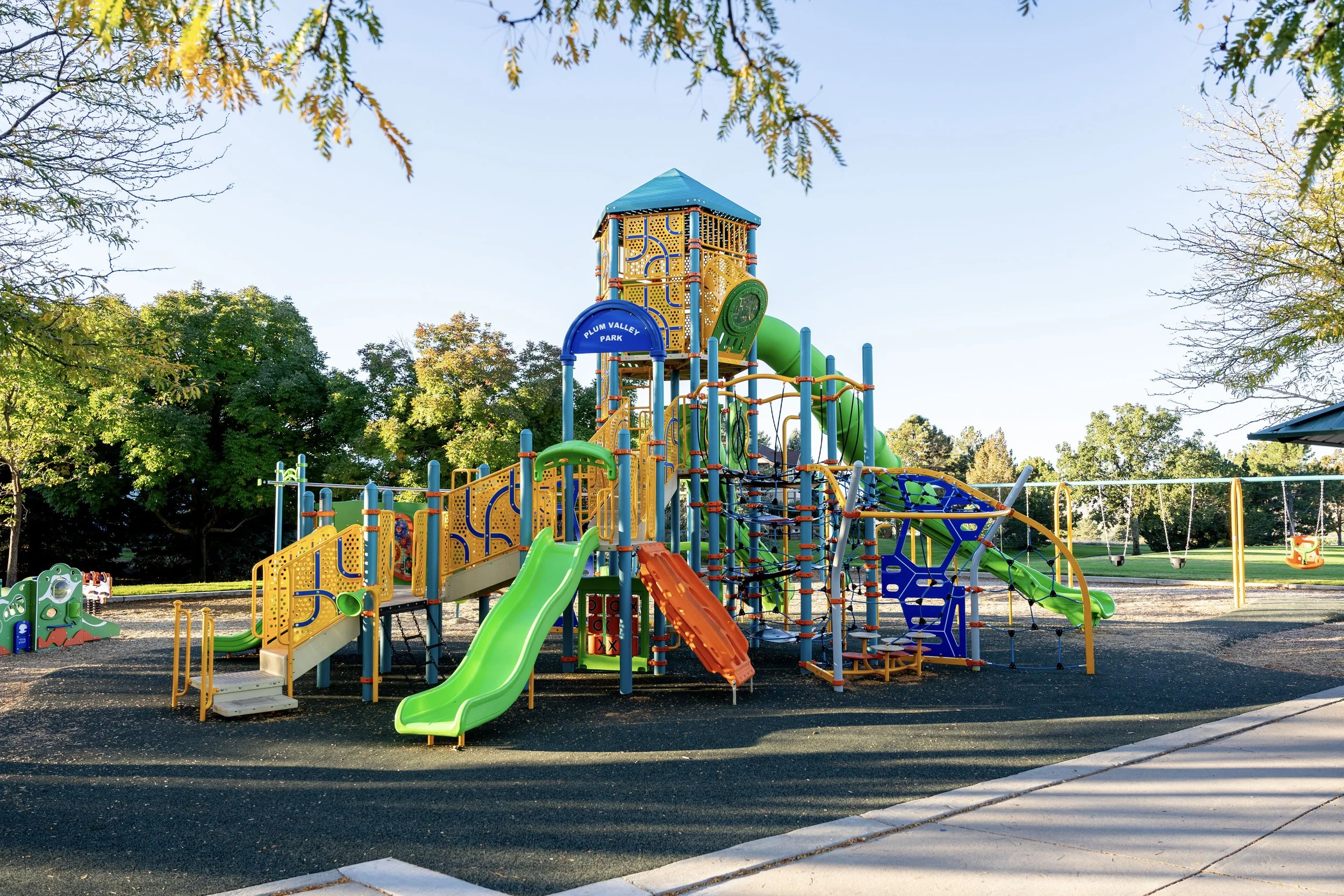 17colorado, highlands ranch, jaax media, play surface, playground, plum valley park, slides, swings.jpg